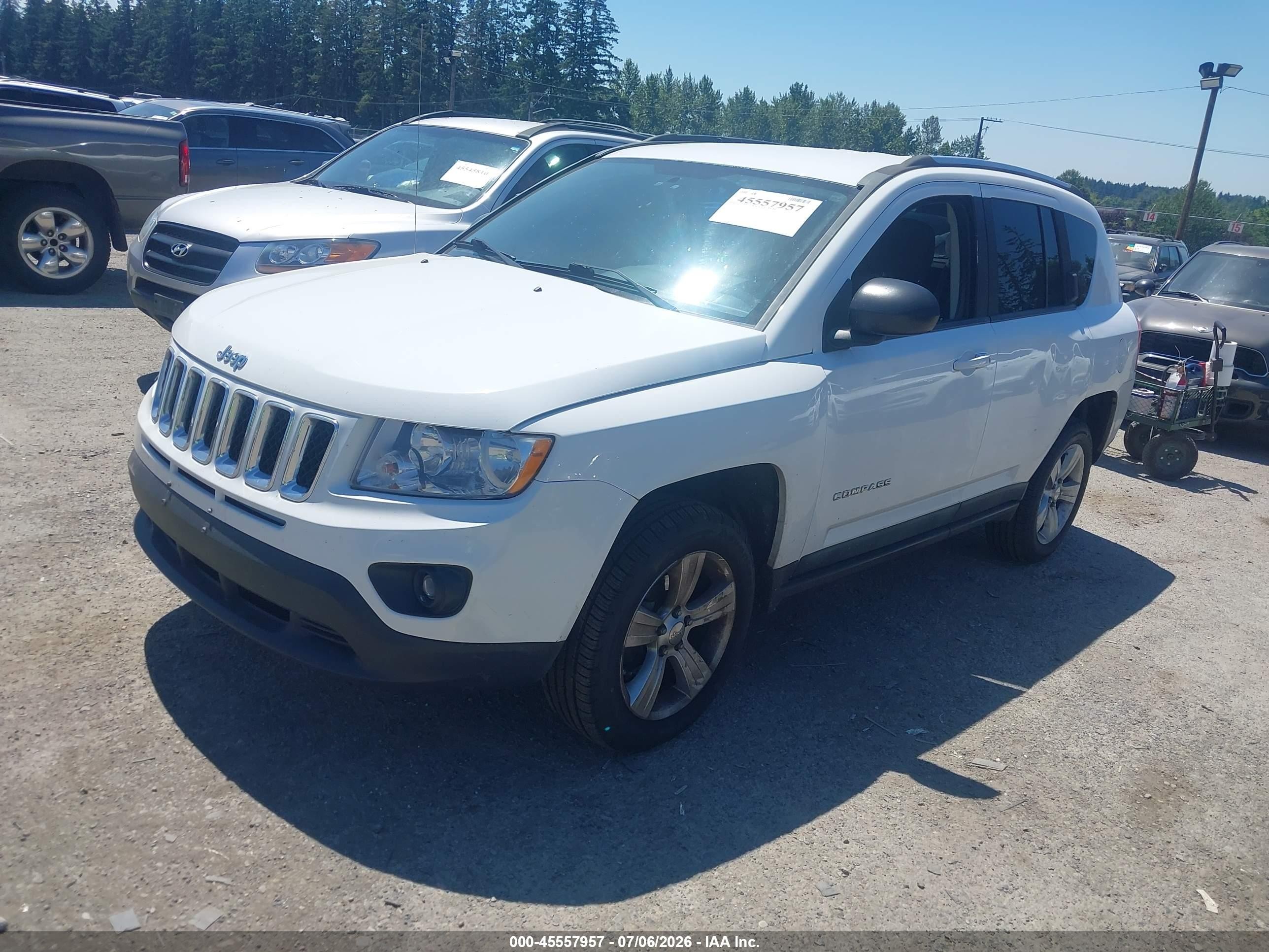 2011 Jeep Compass   White vin: 1J4NT1FA4BD243187