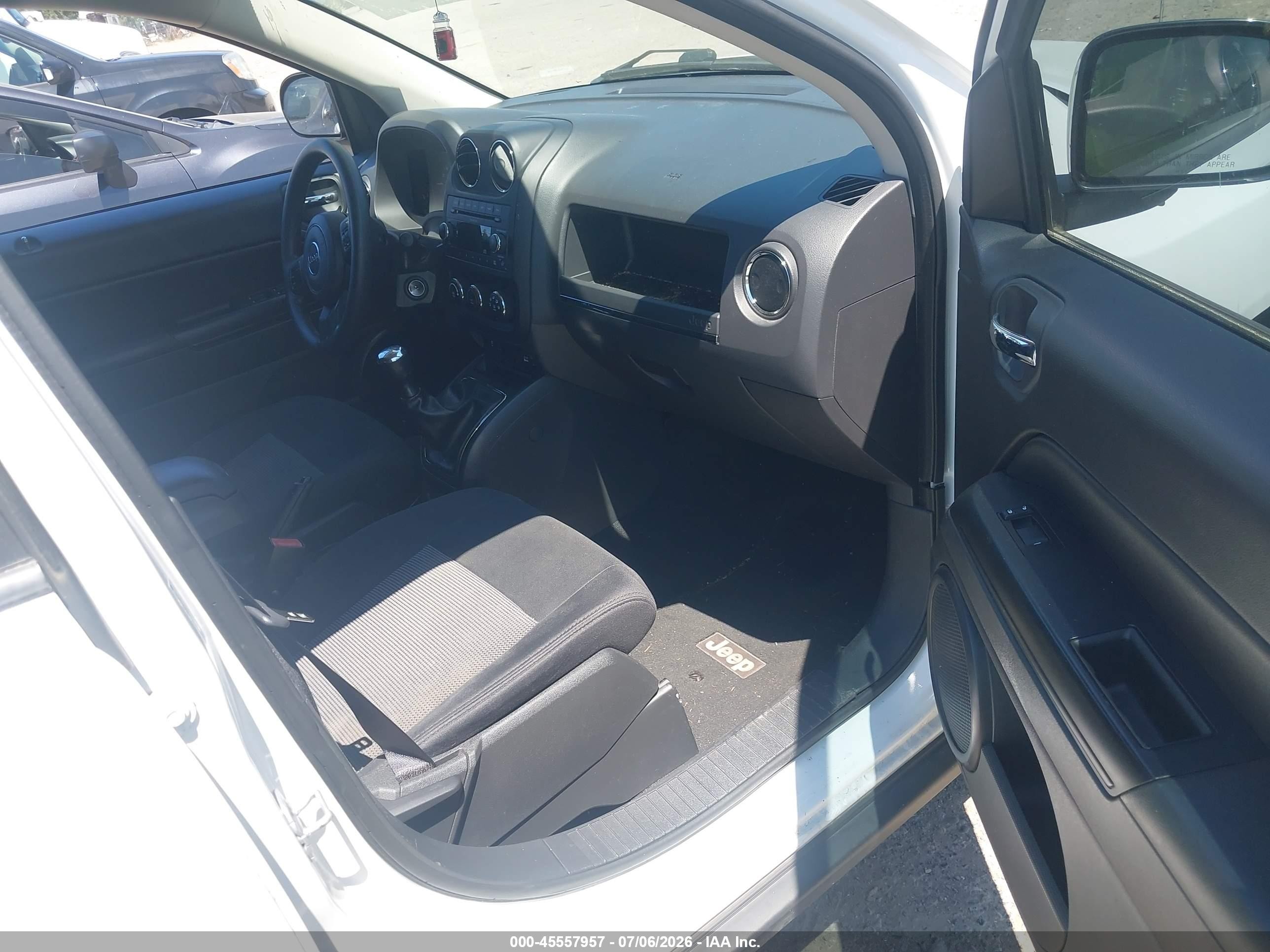2011 Jeep Compass   White vin: 1J4NT1FA4BD243187