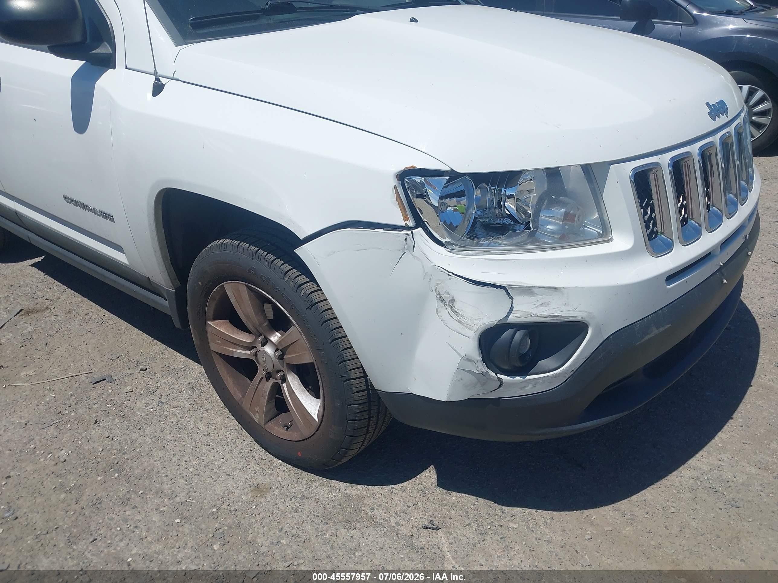 2011 Jeep Compass   White vin: 1J4NT1FA4BD243187