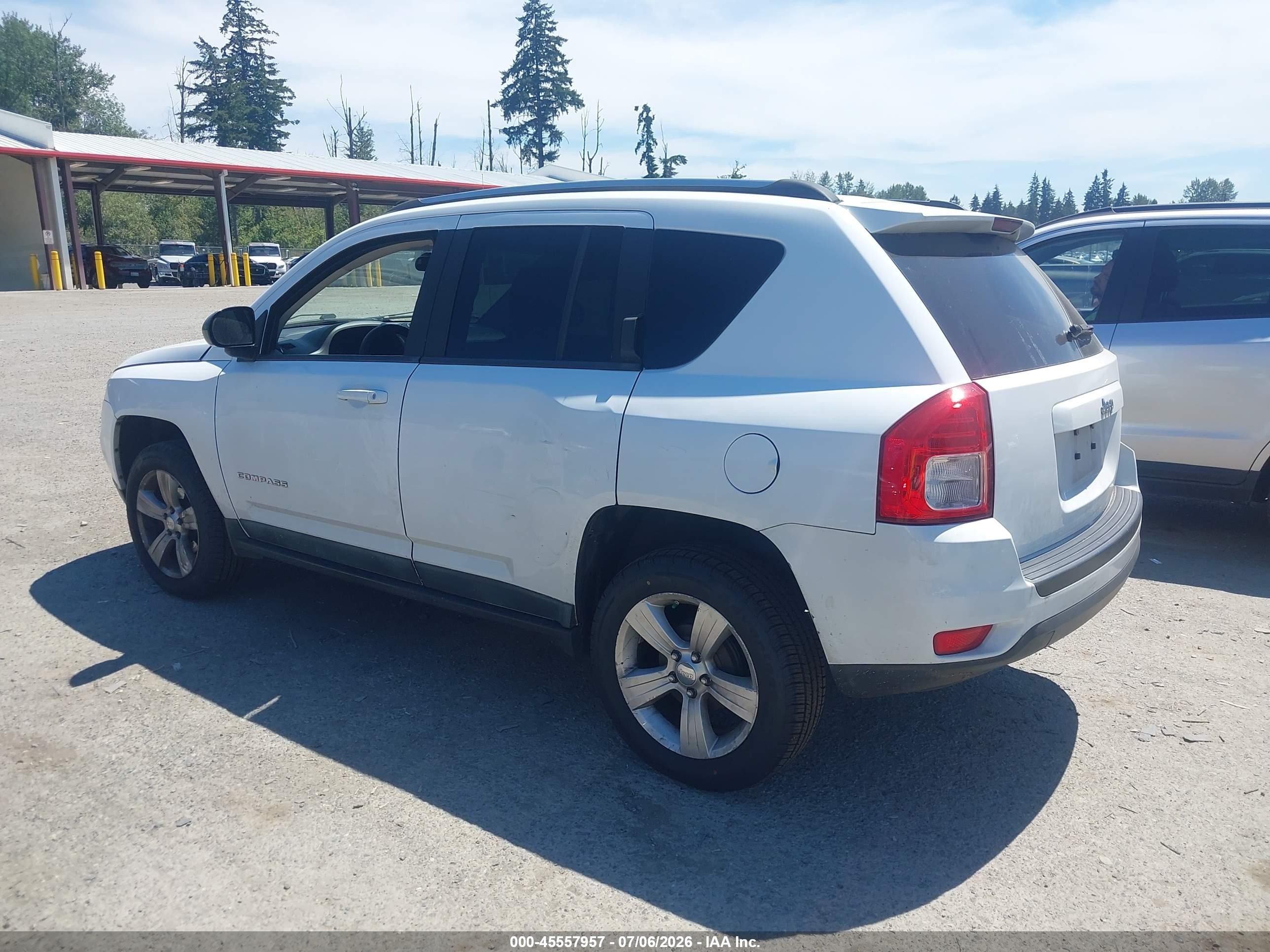2011 Jeep Compass   White vin: 1J4NT1FA4BD243187