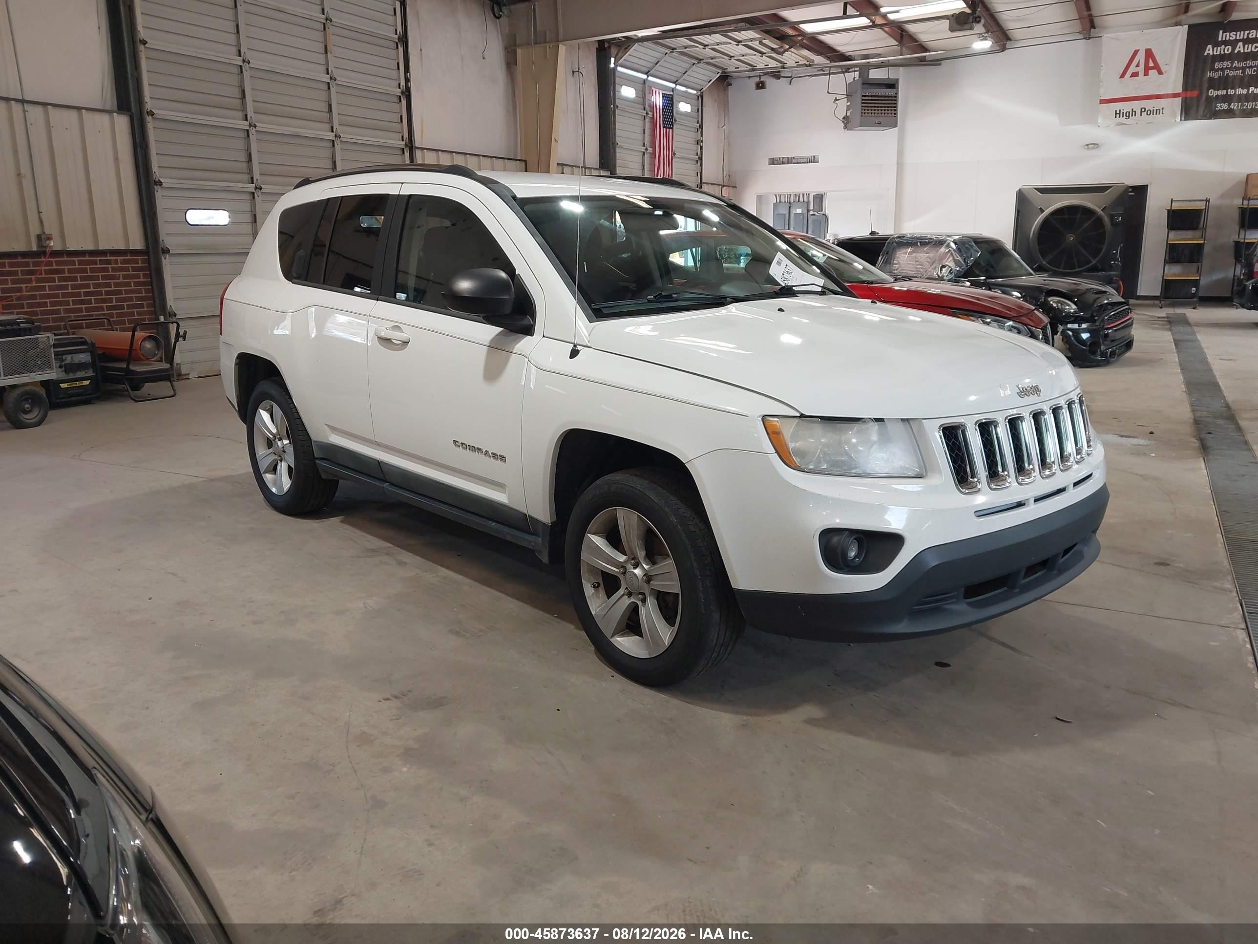 2011 Jeep Compass   White vin: 1J4NT1FA8BD271963
