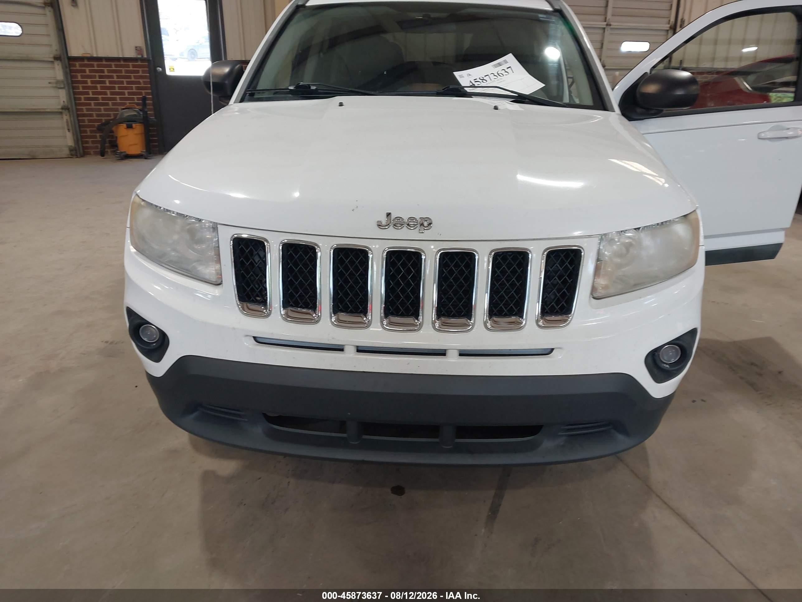 2011 Jeep Compass   White vin: 1J4NT1FA8BD271963