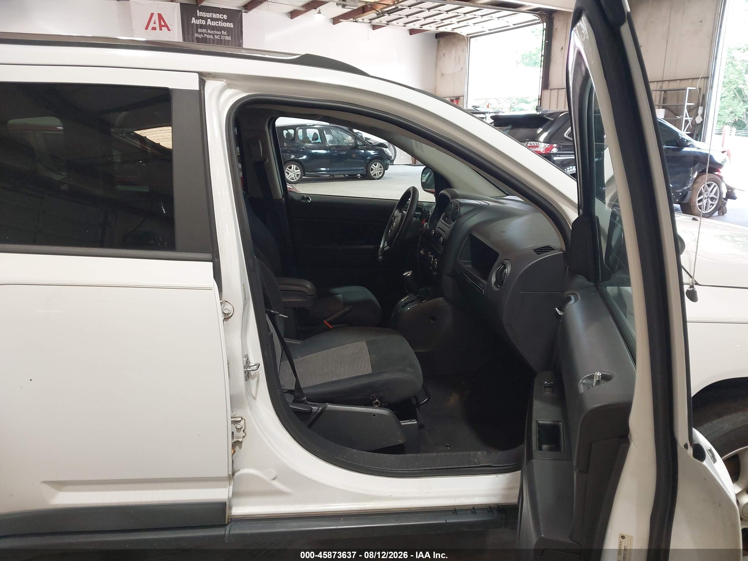 2011 Jeep Compass   White vin: 1J4NT1FA8BD271963