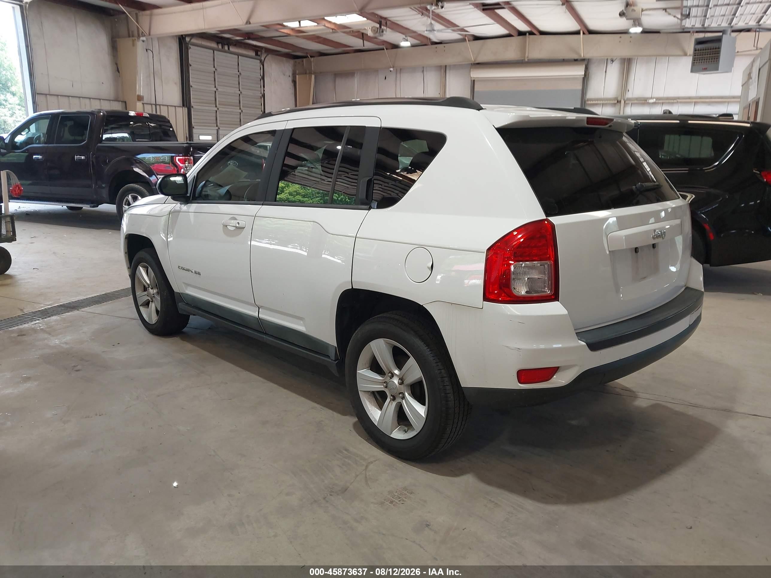 2011 Jeep Compass   White vin: 1J4NT1FA8BD271963