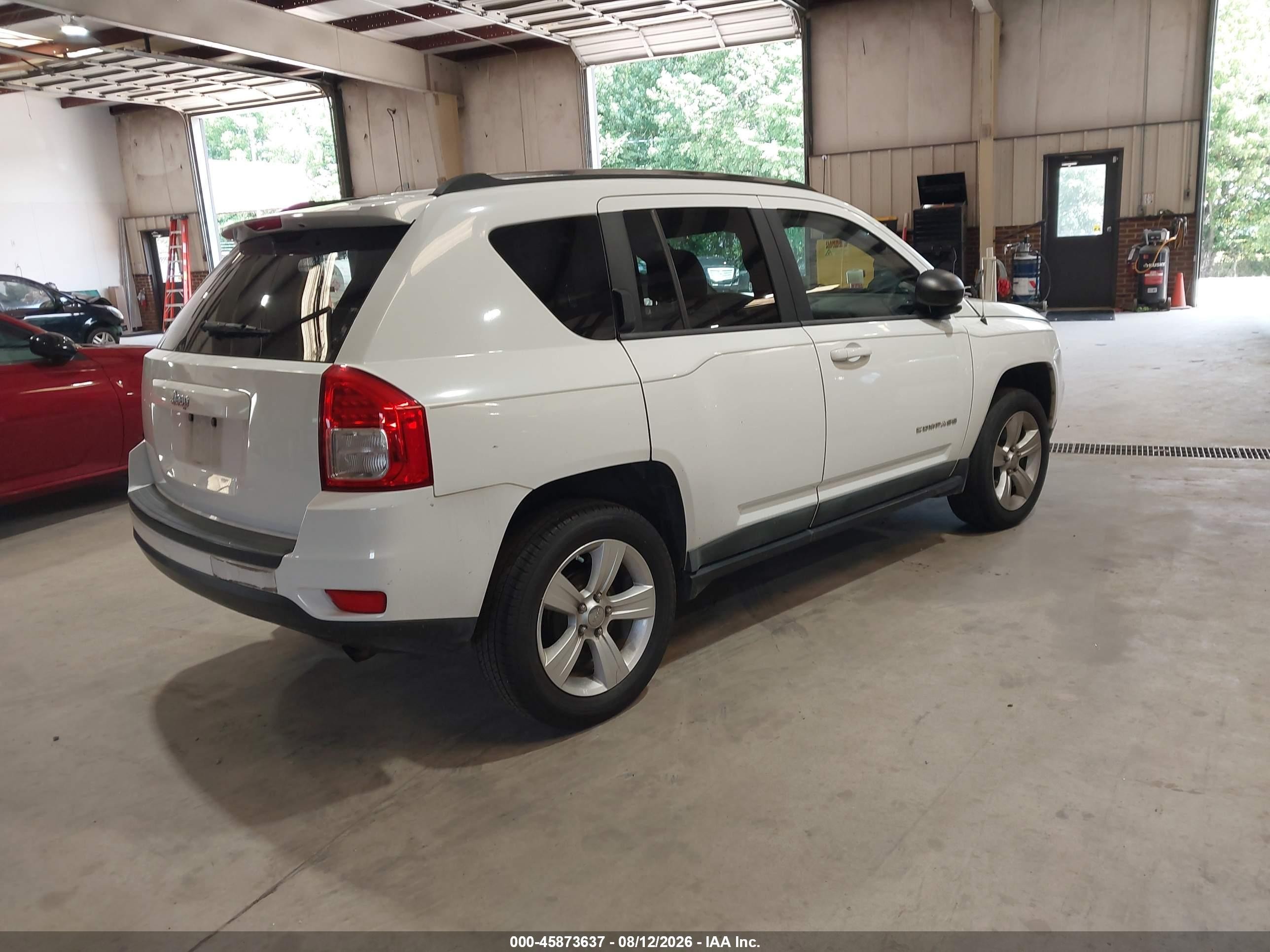 2011 Jeep Compass   White vin: 1J4NT1FA8BD271963