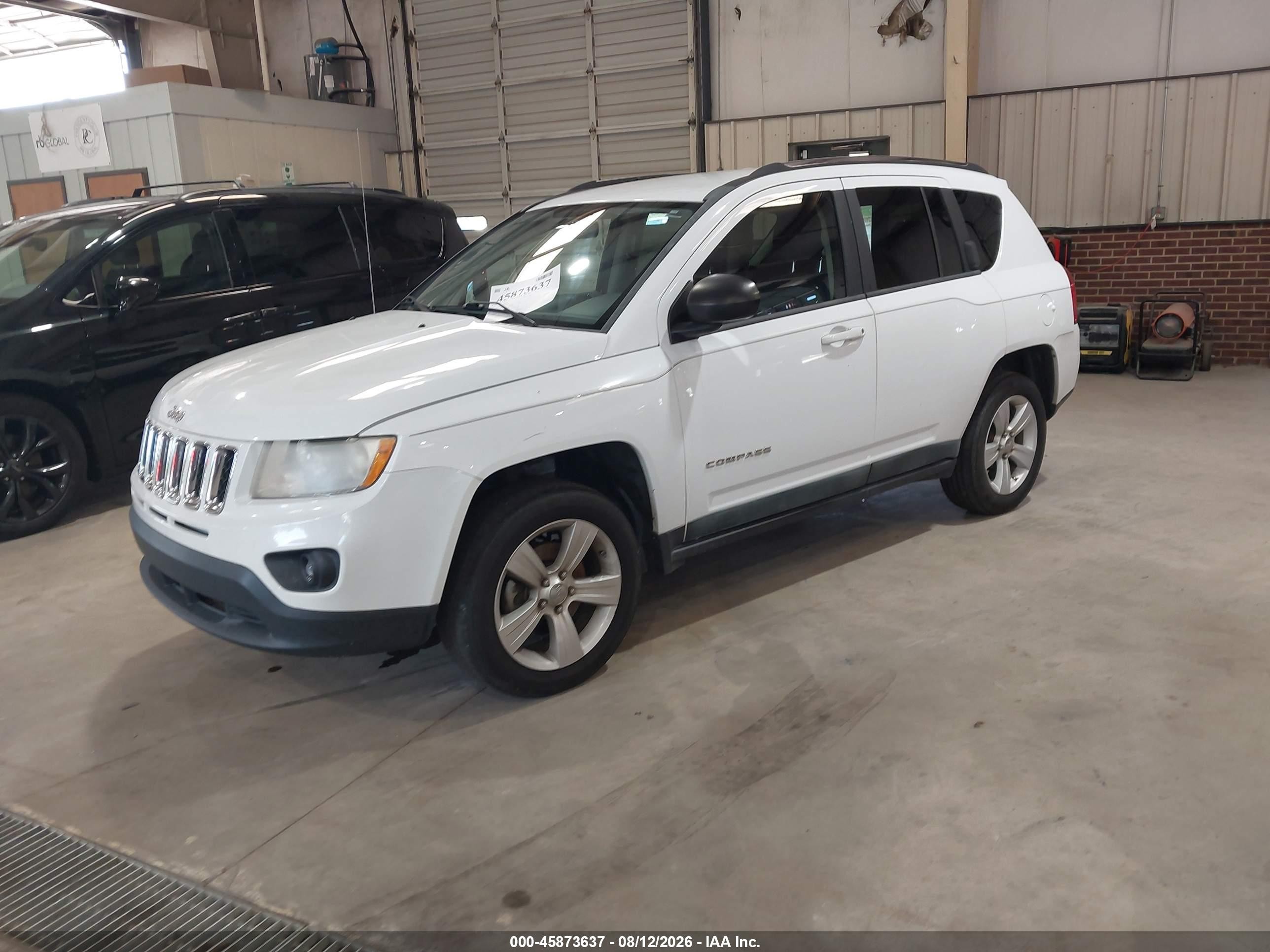 2011 Jeep Compass   White vin: 1J4NT1FA8BD271963