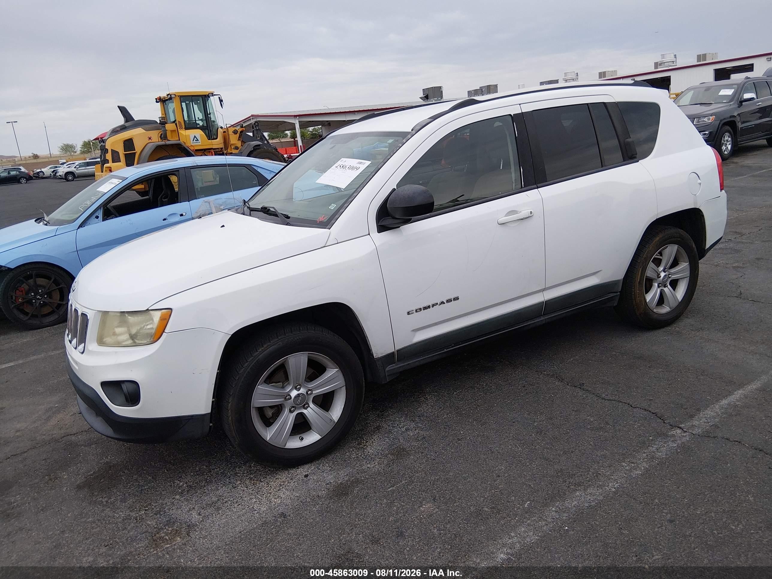 2011 Jeep Compass   White vin: 1J4NT1FB4BD264369