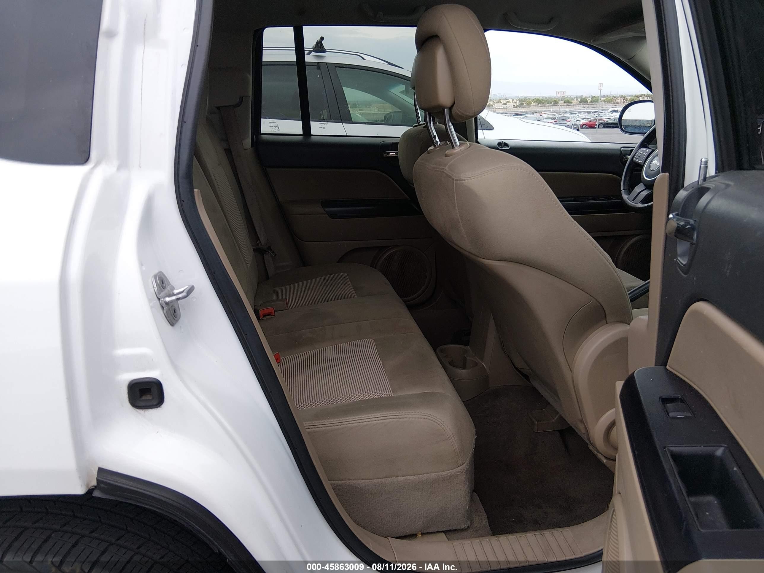 2011 Jeep Compass   White vin: 1J4NT1FB4BD264369