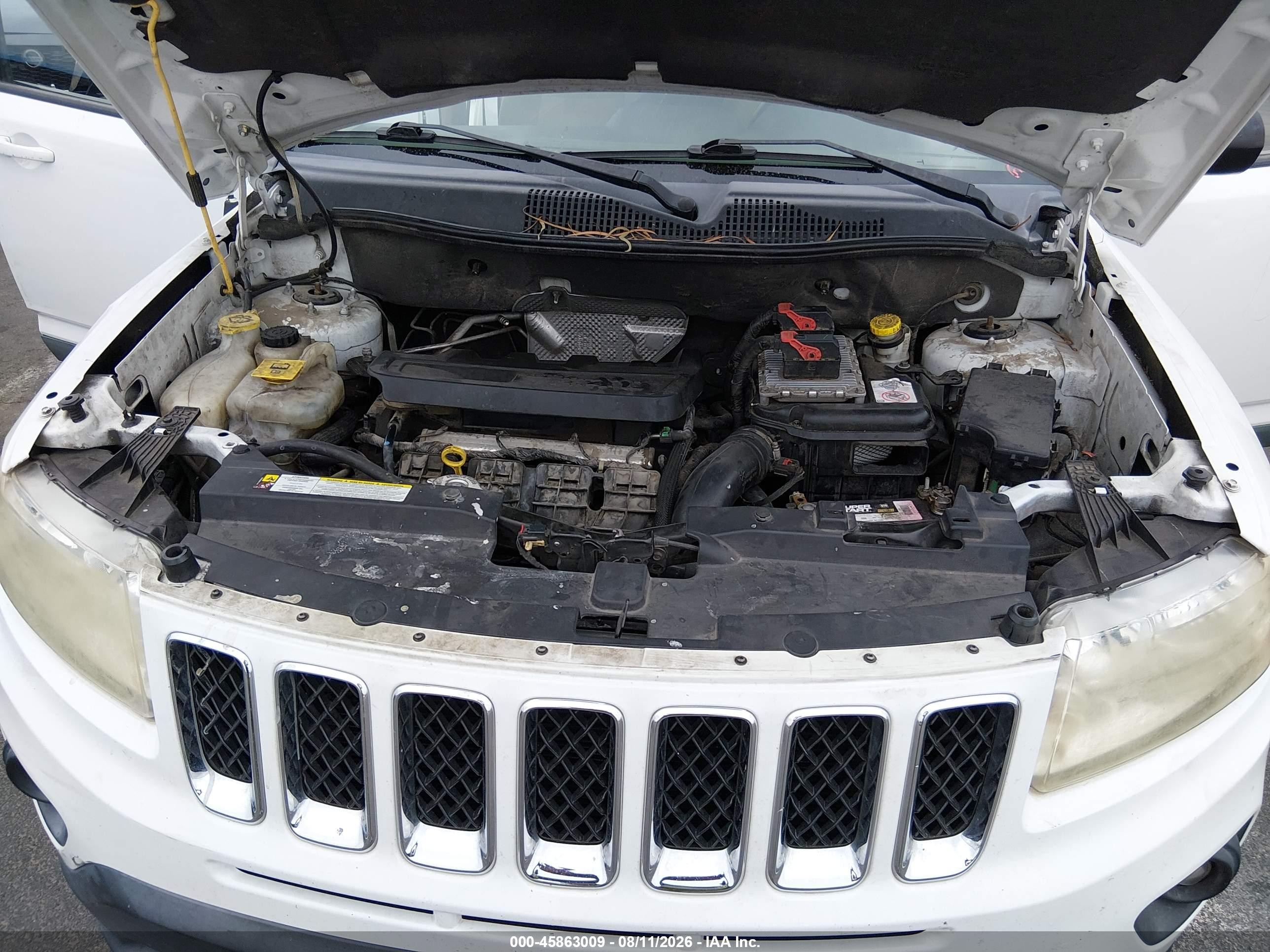 2011 Jeep Compass   White vin: 1J4NT1FB4BD264369
