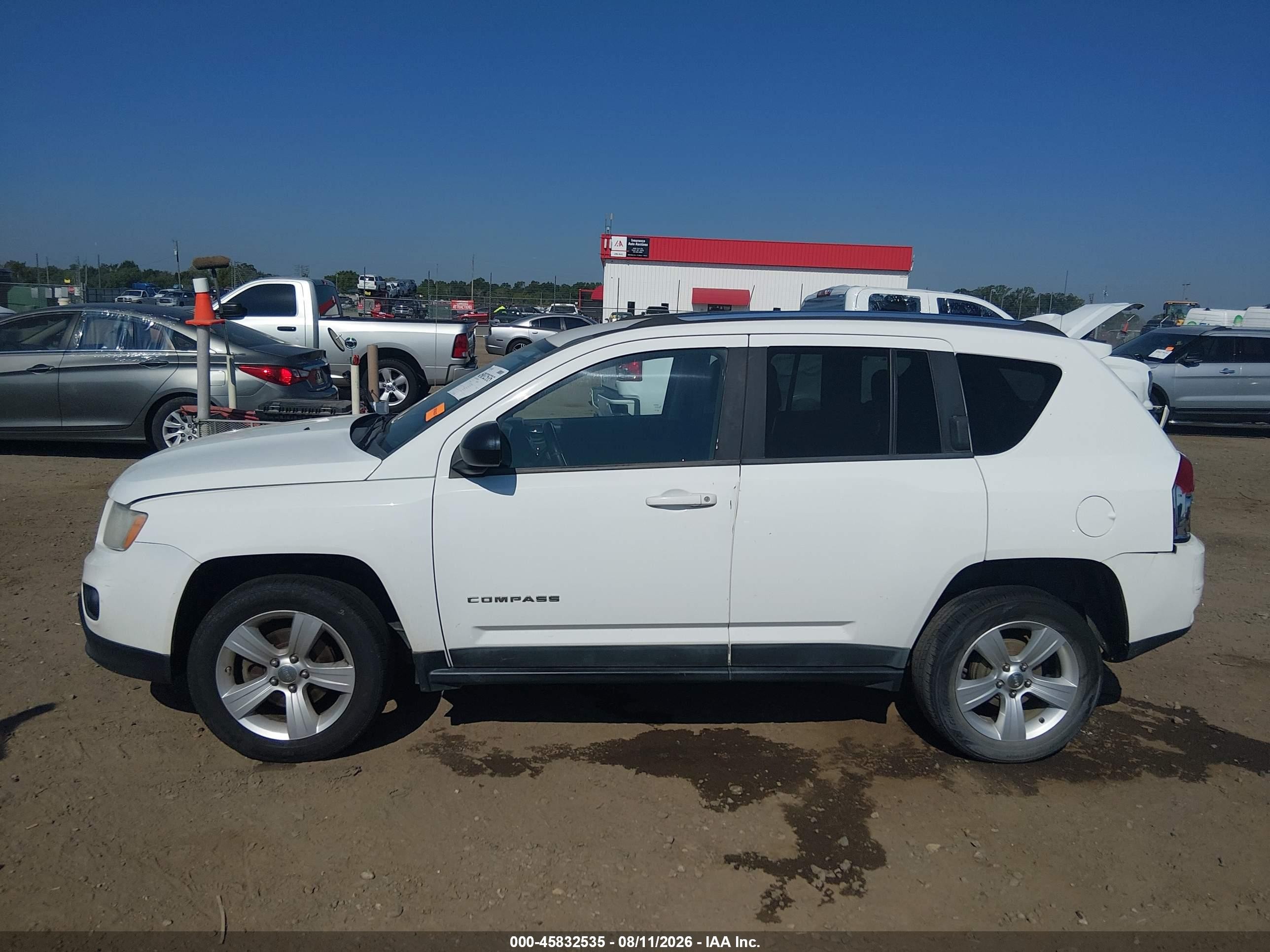 2011 Jeep Compass   White vin: 1J4NT1FB6BD241109