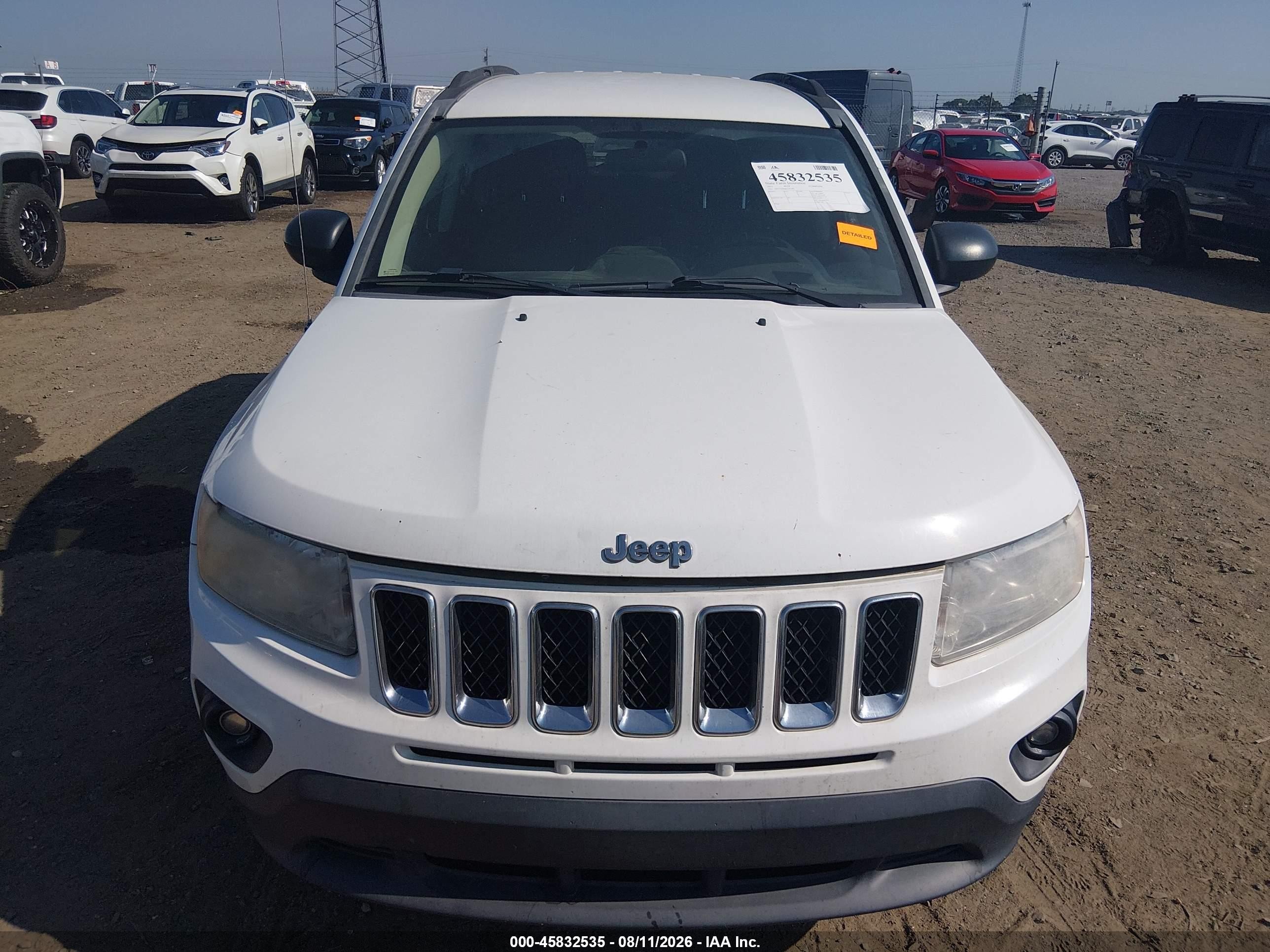 2011 Jeep Compass   White vin: 1J4NT1FB6BD241109
