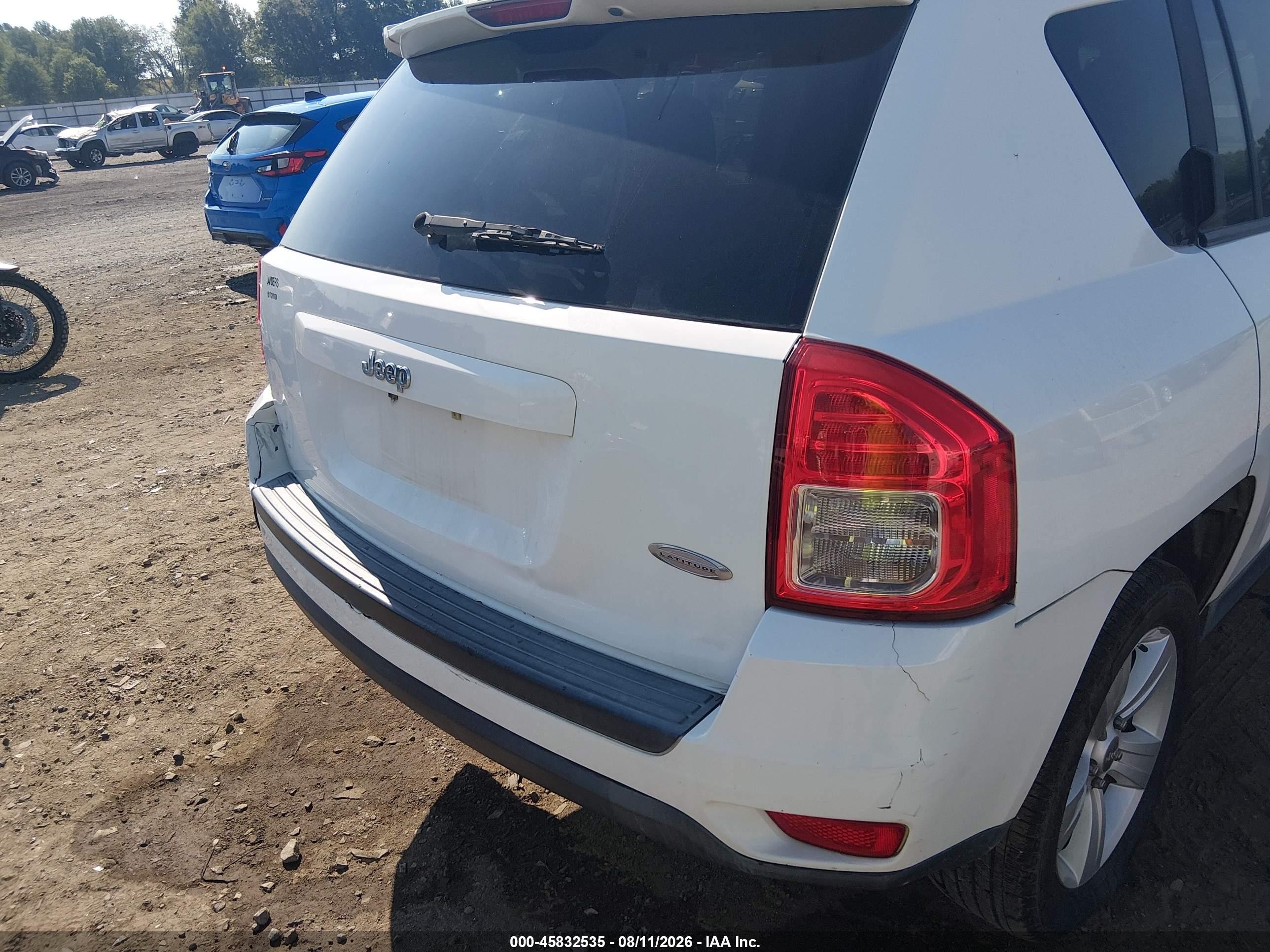 2011 Jeep Compass   White vin: 1J4NT1FB6BD241109