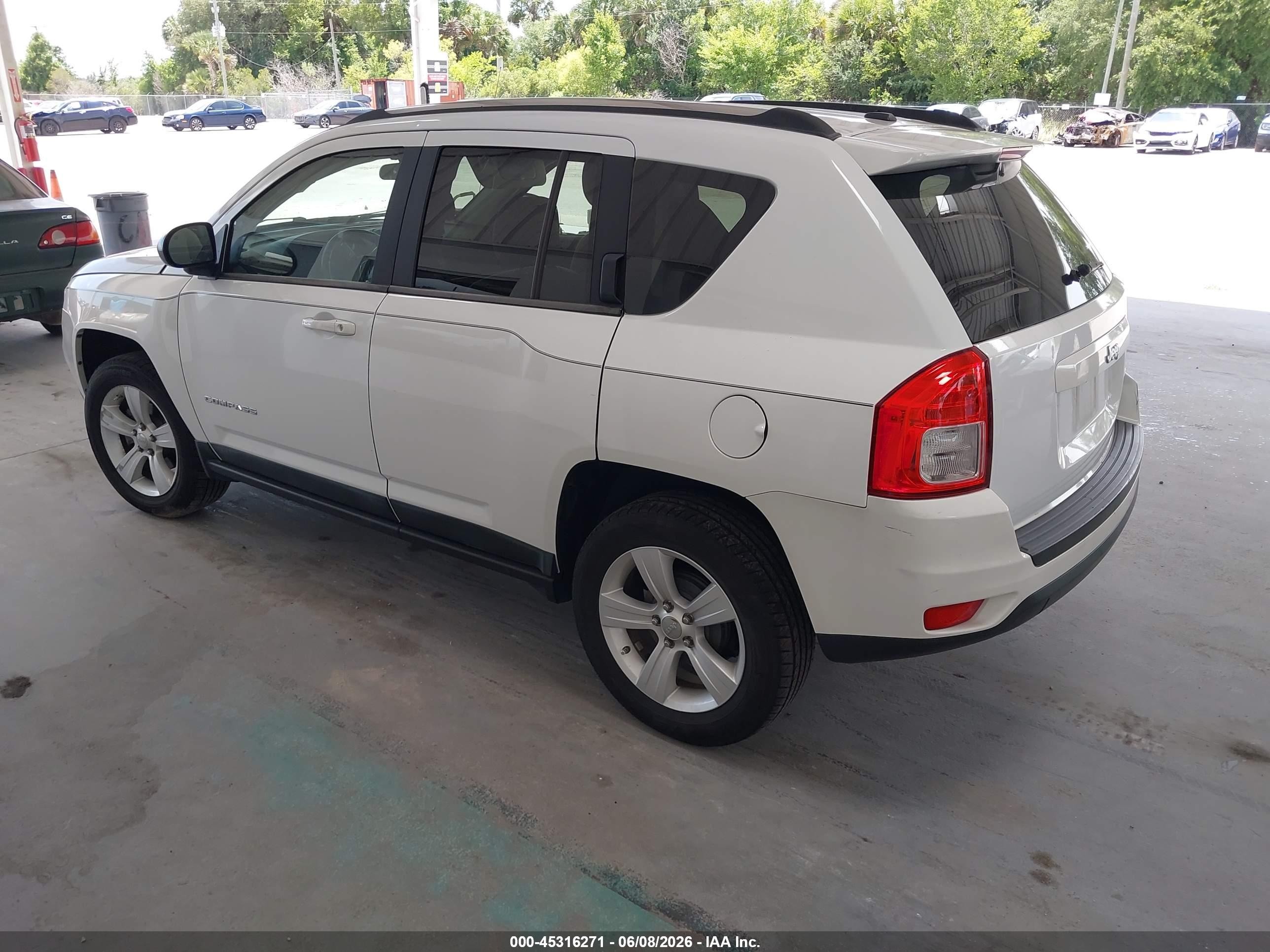 2011 Jeep Compass   White vin: 1J4NT1FB6BD267659