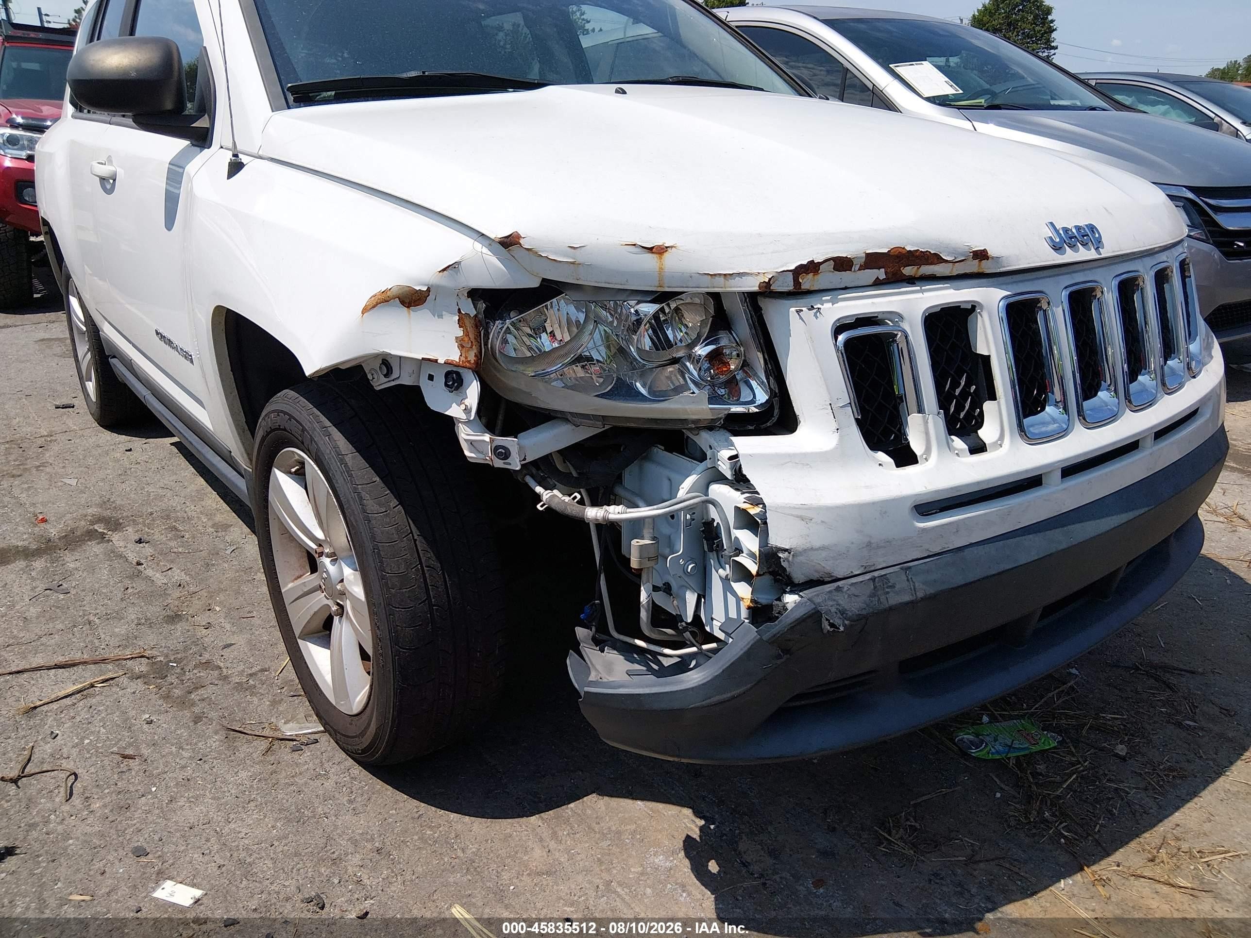 2011 Jeep Compass   White vin: 1J4NT1FB8BD190082