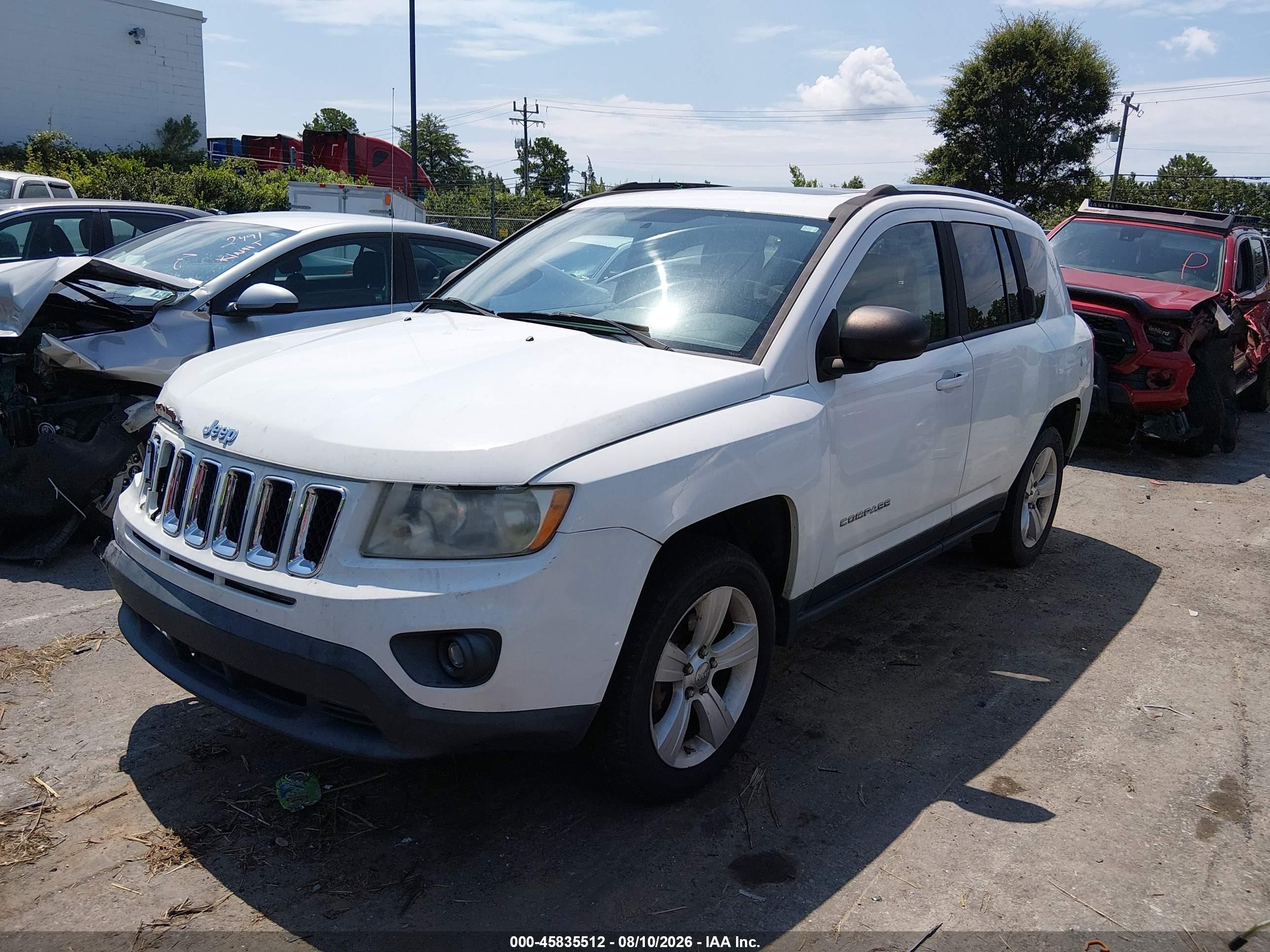 2011 Jeep Compass   White vin: 1J4NT1FB8BD190082