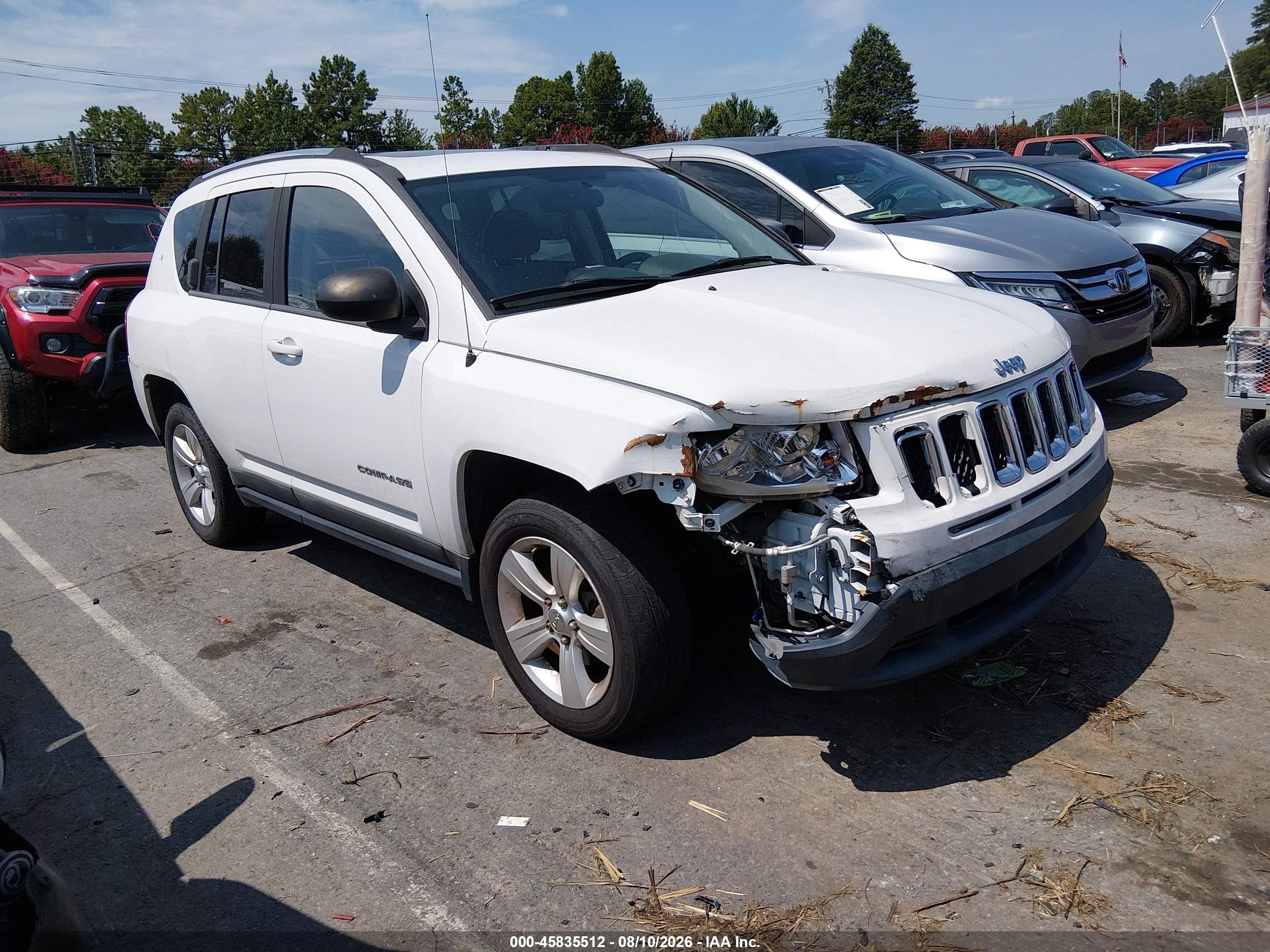 2011 Jeep Compass   White vin: 1J4NT1FB8BD190082