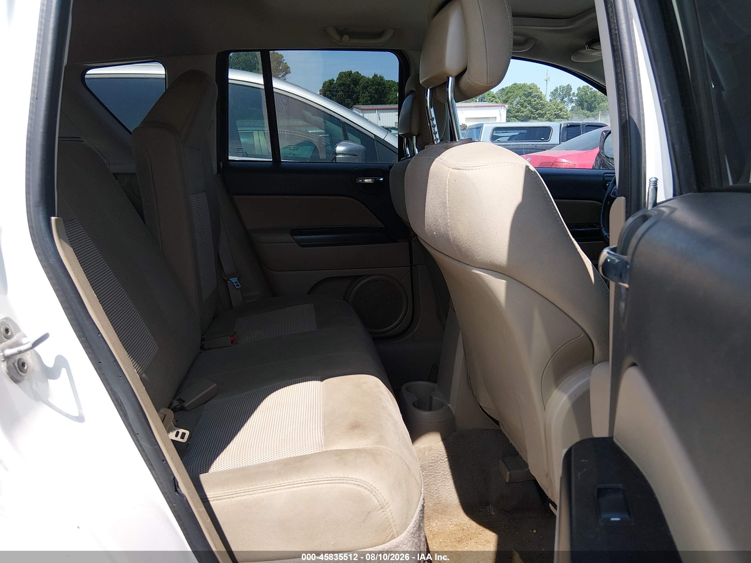 2011 Jeep Compass   White vin: 1J4NT1FB8BD190082