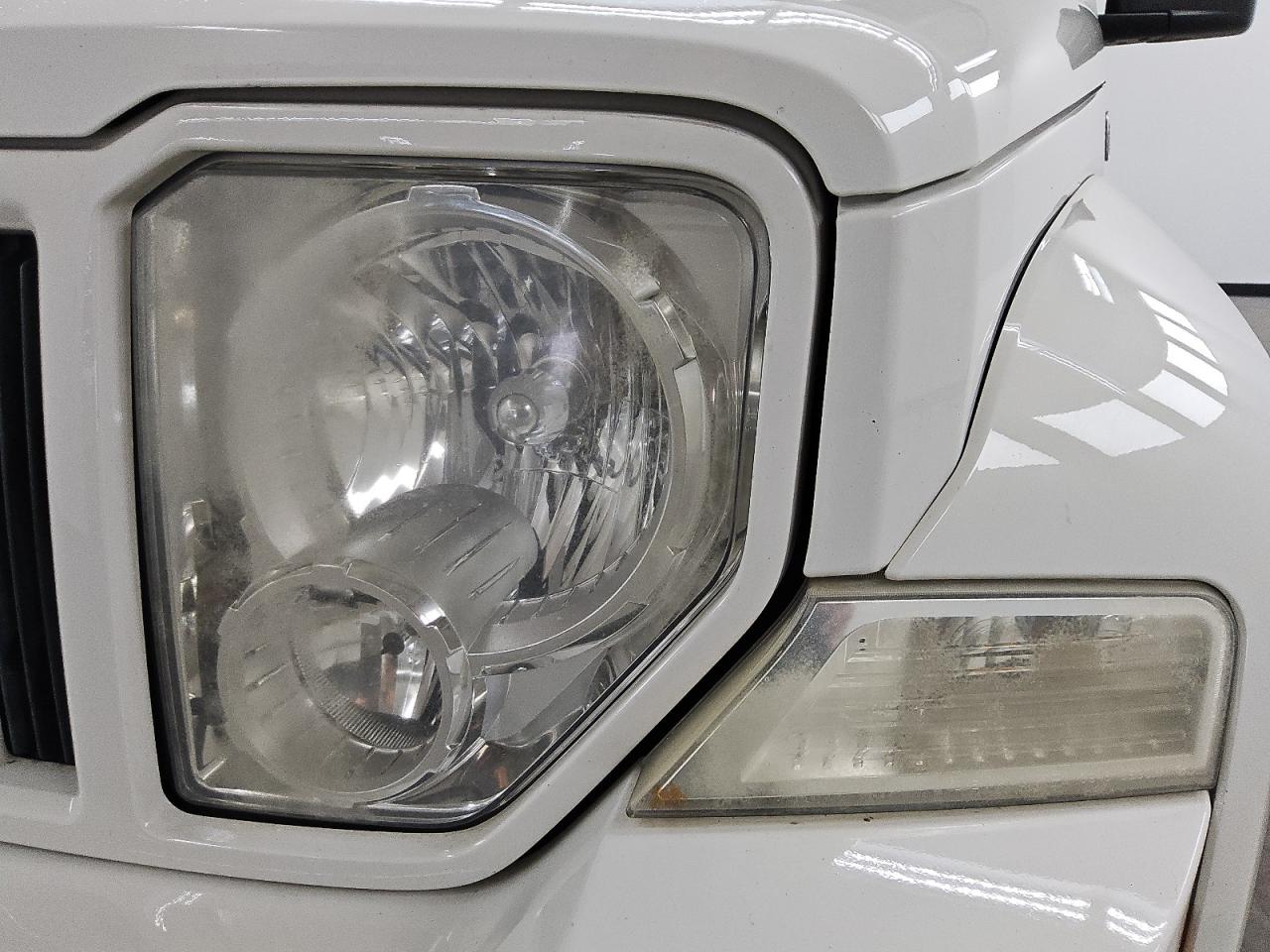 2010 Jeep Liberty Sport White vin: 1J4PN2GK3AW110438 Damage: Left Head Lamp, Faded, Repair Required