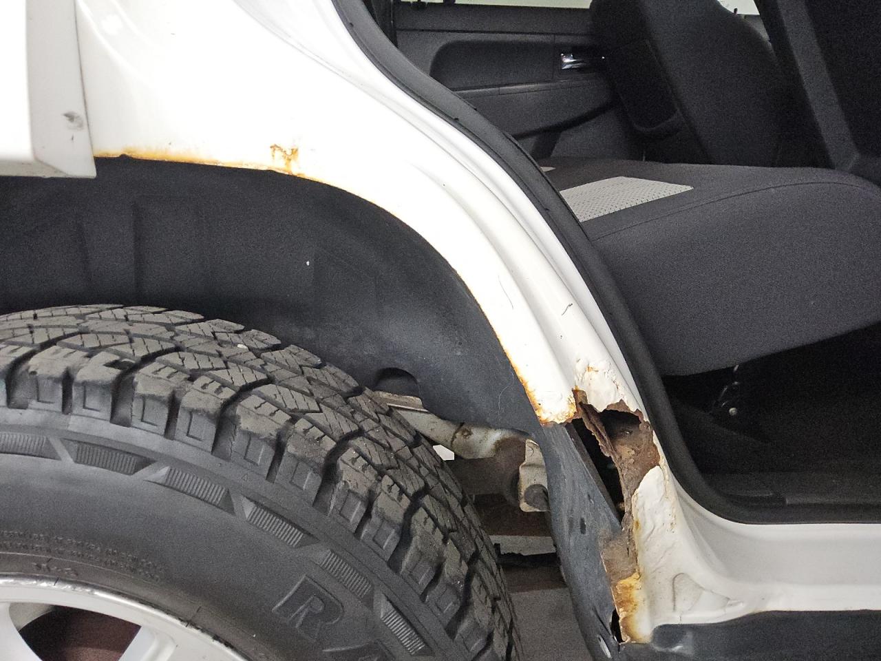 2010 Jeep Liberty Sport White vin: 1J4PN2GK3AW110438 Damage: Right Rocker Panel, Corrosion, 5 To 6 Inches