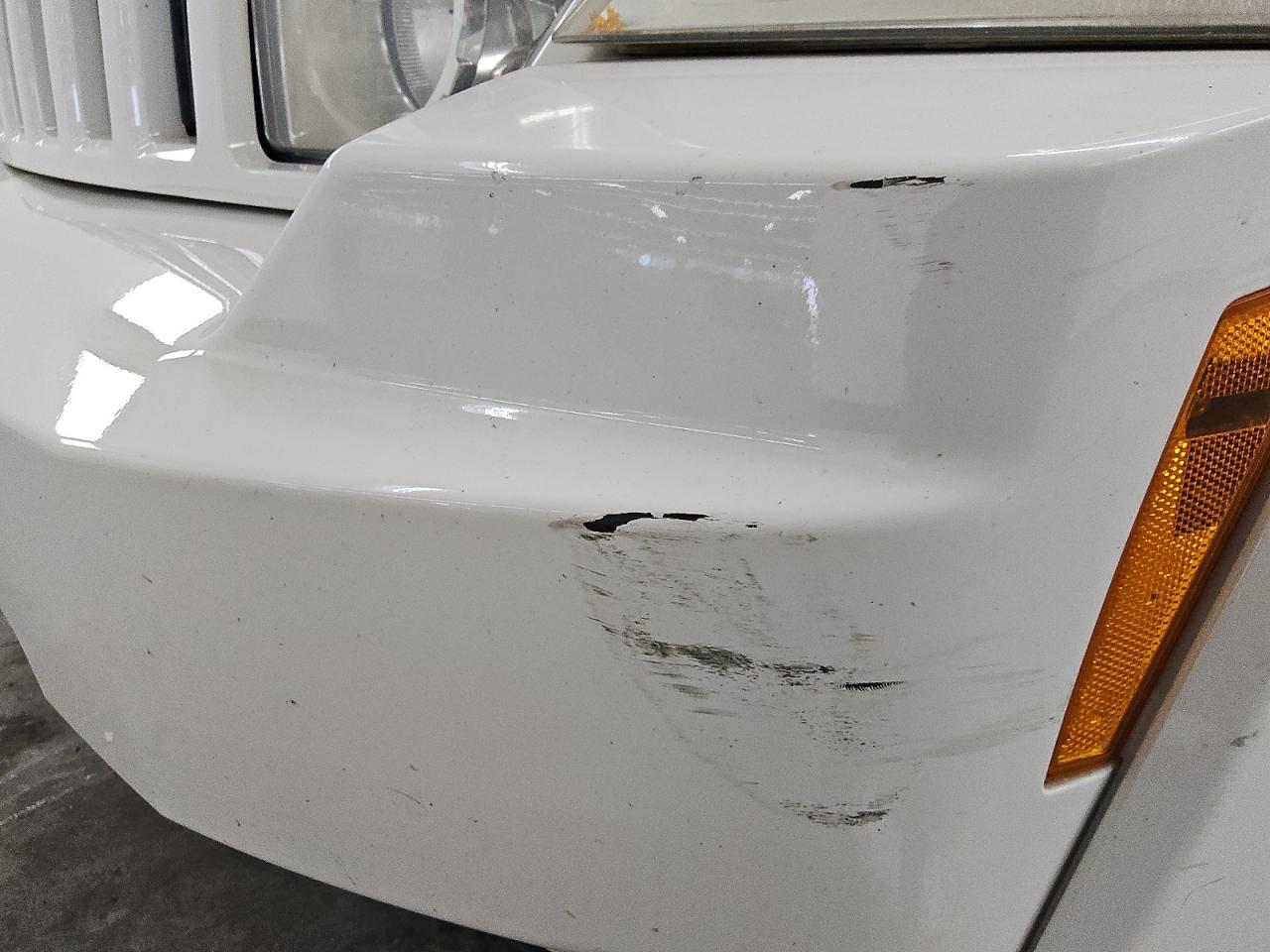 2010 Jeep Liberty Sport White vin: 1J4PN2GK3AW110438 Damage: Front Bumper, Scraped, 7 To 8 Inches
