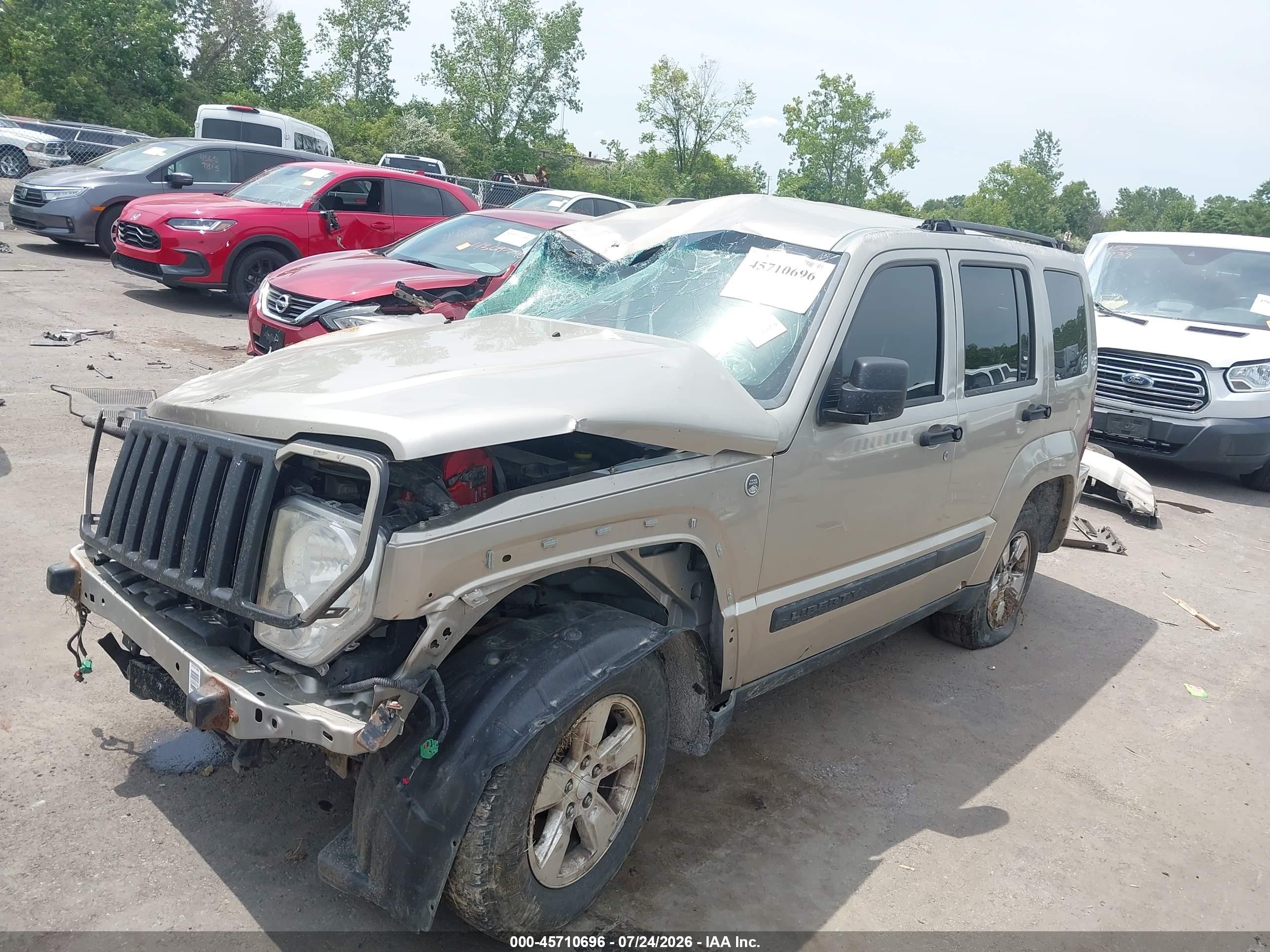 2010 Jeep Liberty Sport Золотой vin: 1J4PN2GK9AW118589