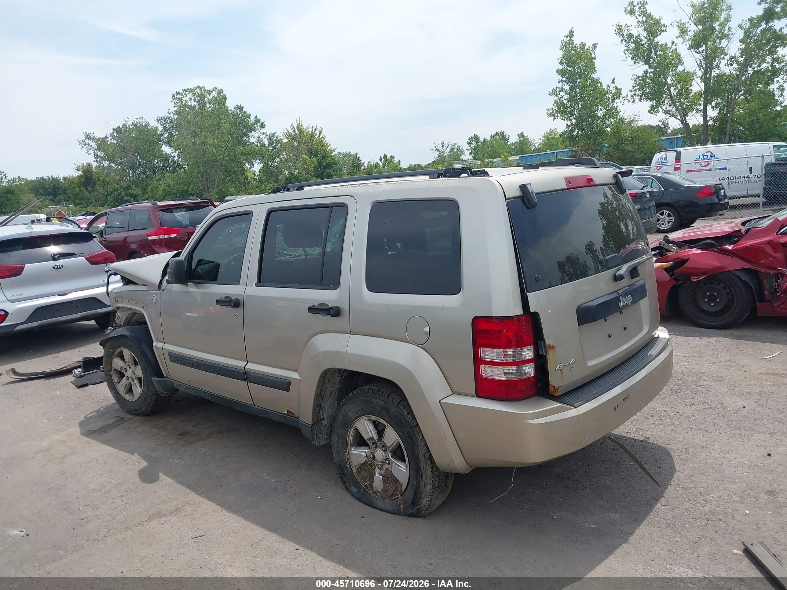 2010 Jeep Liberty Sport Золотой vin: 1J4PN2GK9AW118589