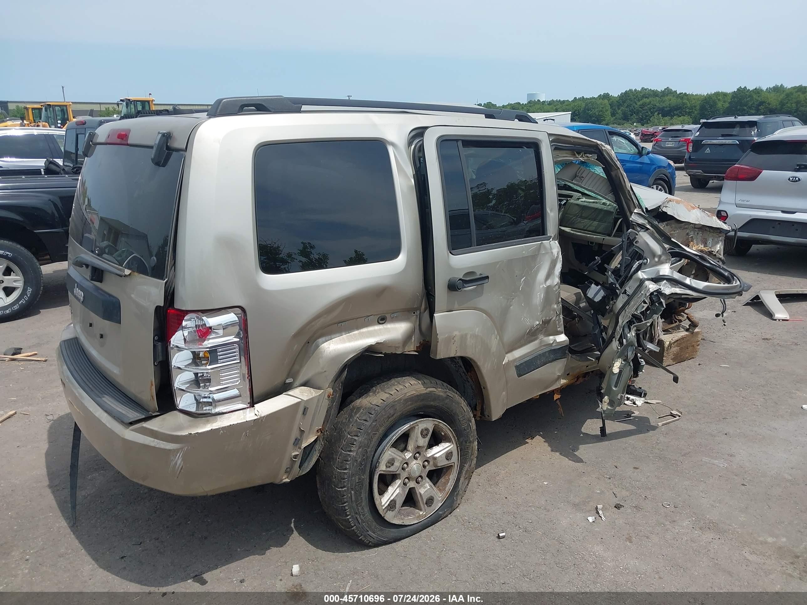 2010 Jeep Liberty Sport Золотой vin: 1J4PN2GK9AW118589