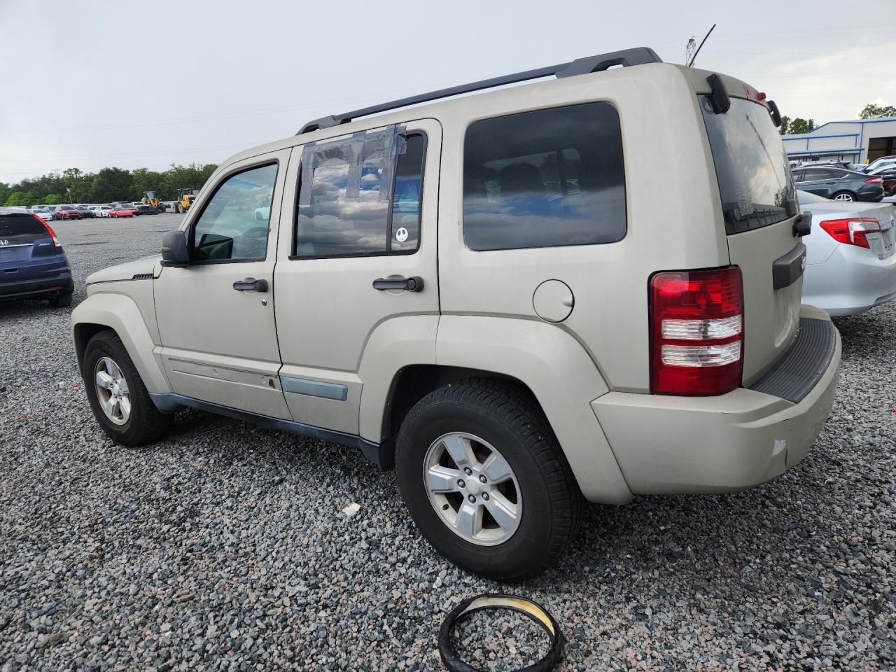 2010 Jeep Liberty Sport Золотой vin: 1J4PP2GK2AW171550