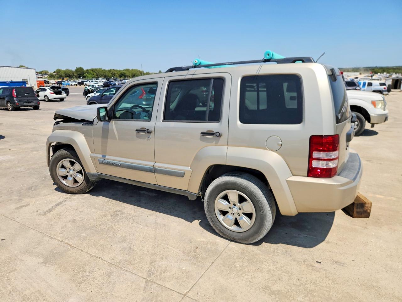 2010 Jeep Liberty Sport Tan vin: 1J4PP2GK5AW112301