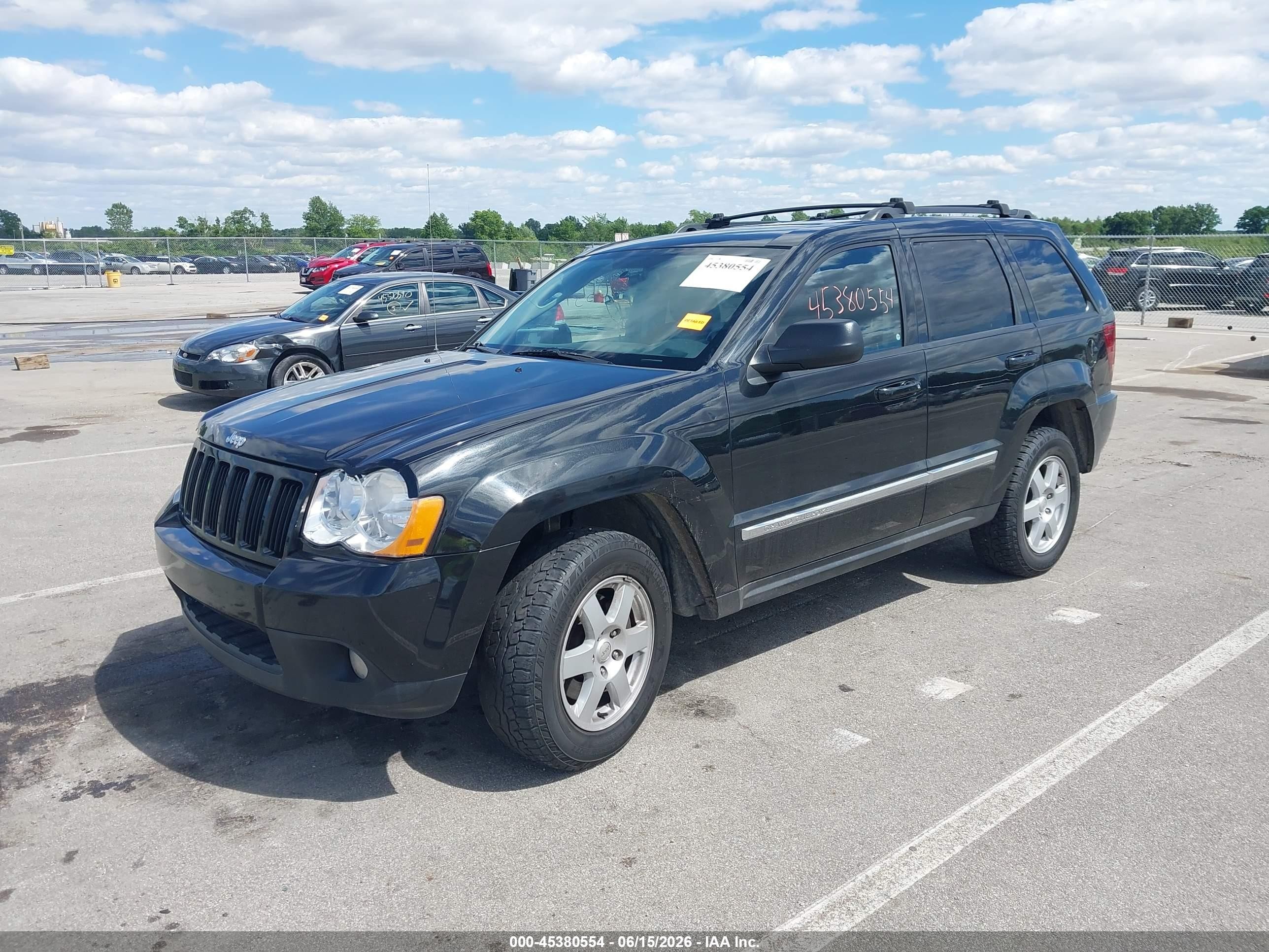 2010 Jeep Grand Cherokee Laredo Черный vin: 1J4PR4GK3AC120033