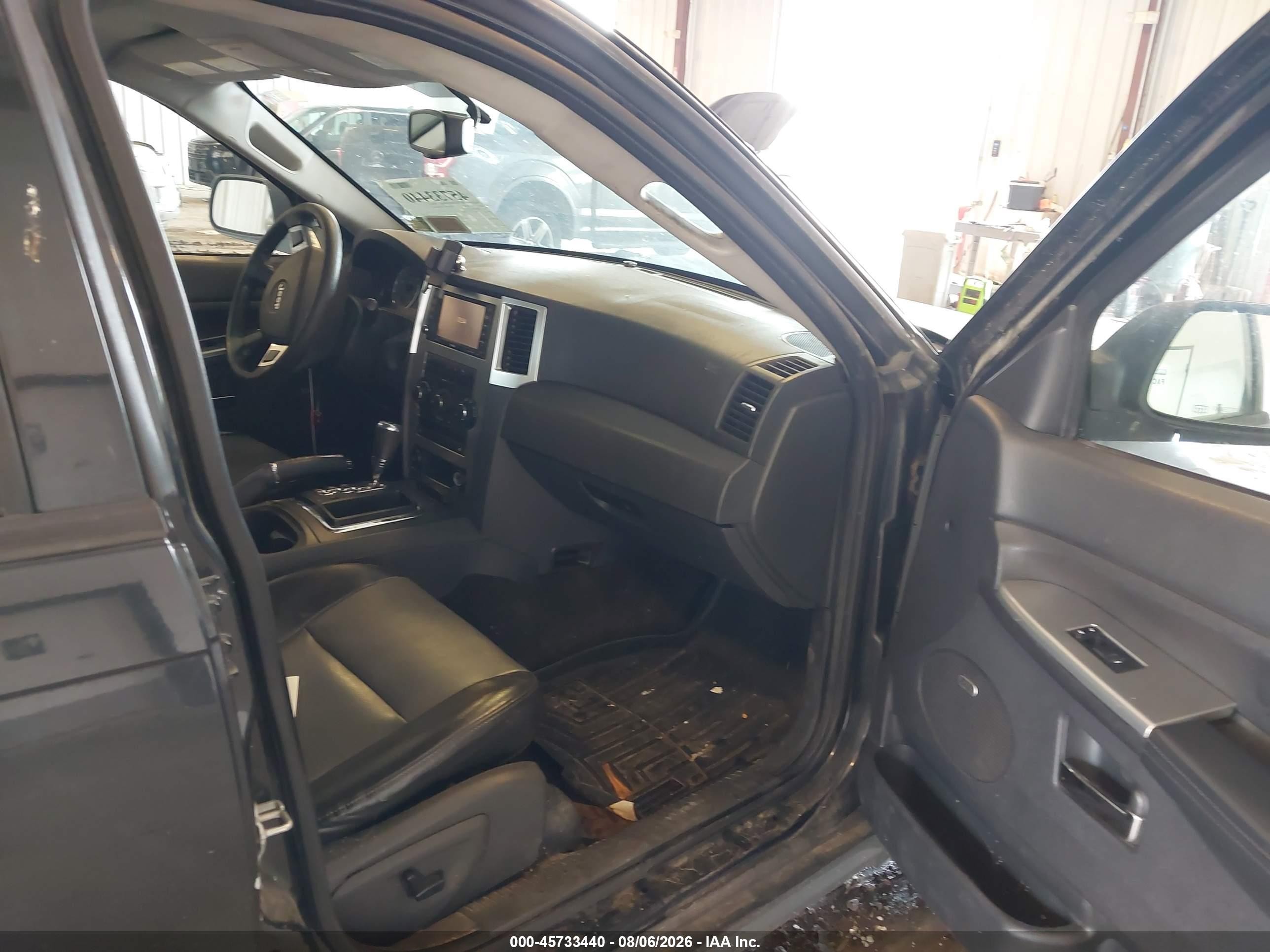 2010 Jeep Grand Cherokee Laredo Черный vin: 1J4PR4GK3AC141500