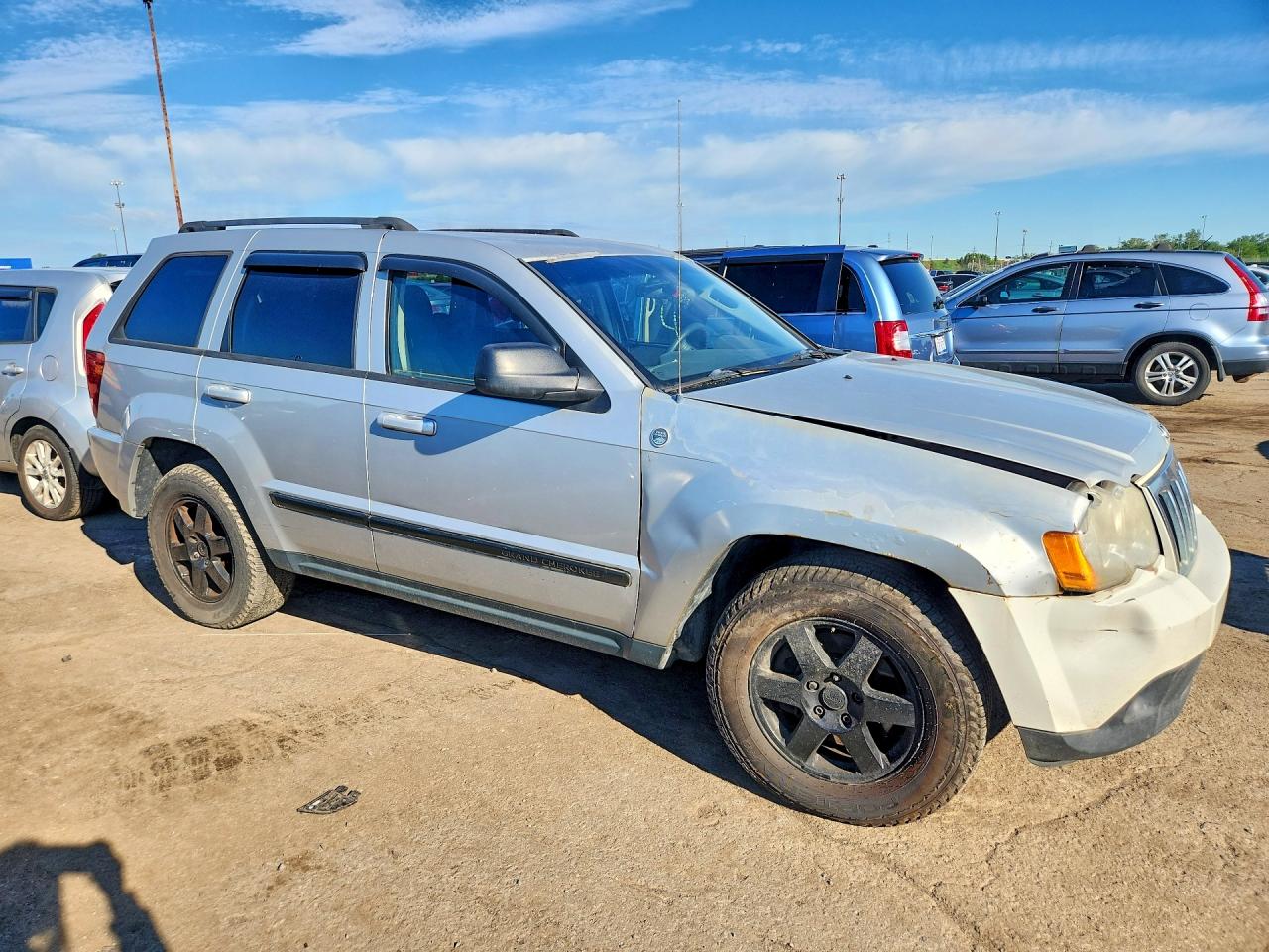 2010 Jeep Grand Cherokee Laredo Beige vin: 1J4PR4GK8AC127558