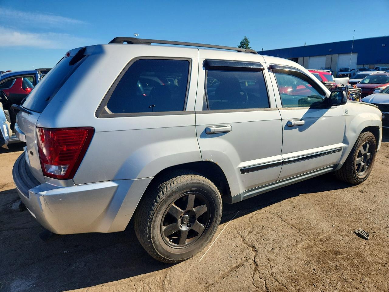 2010 Jeep Grand Cherokee Laredo Beige vin: 1J4PR4GK8AC127558