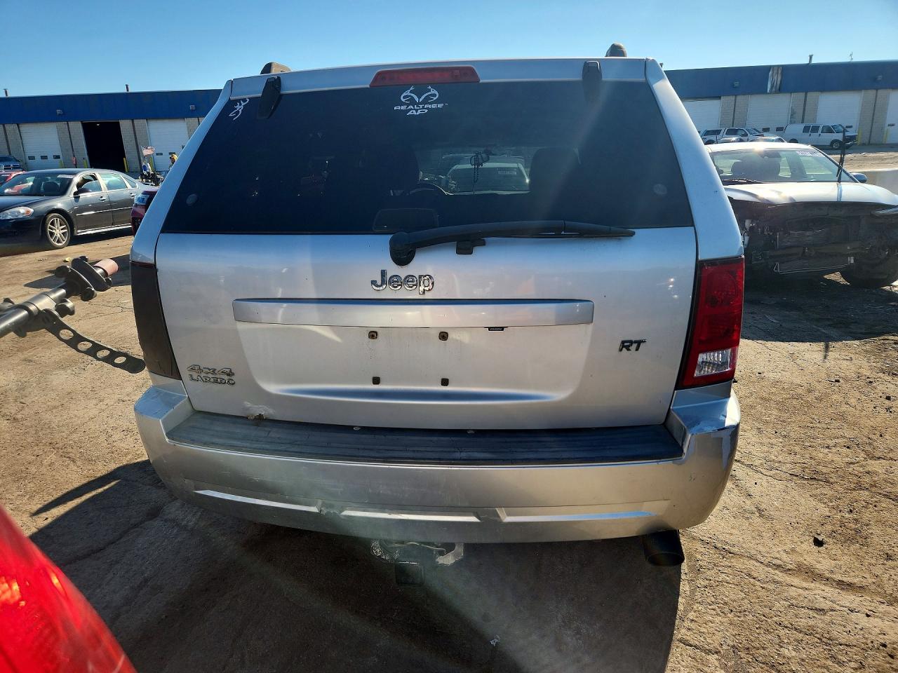 2010 Jeep Grand Cherokee Laredo Beige vin: 1J4PR4GK8AC127558