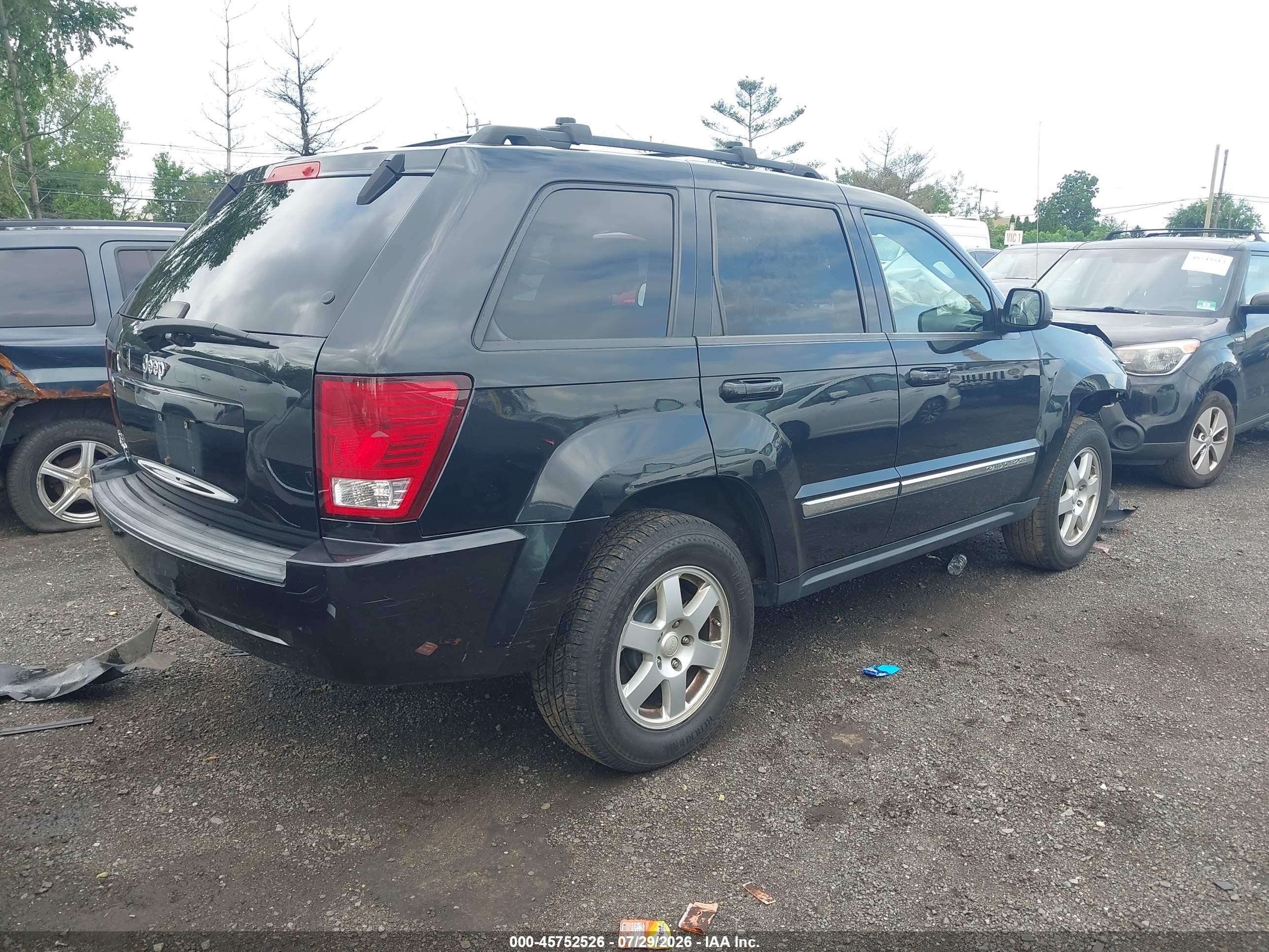 2010 Jeep Grand Cherokee Laredo Черный vin: 1J4PR4GK8AC137801