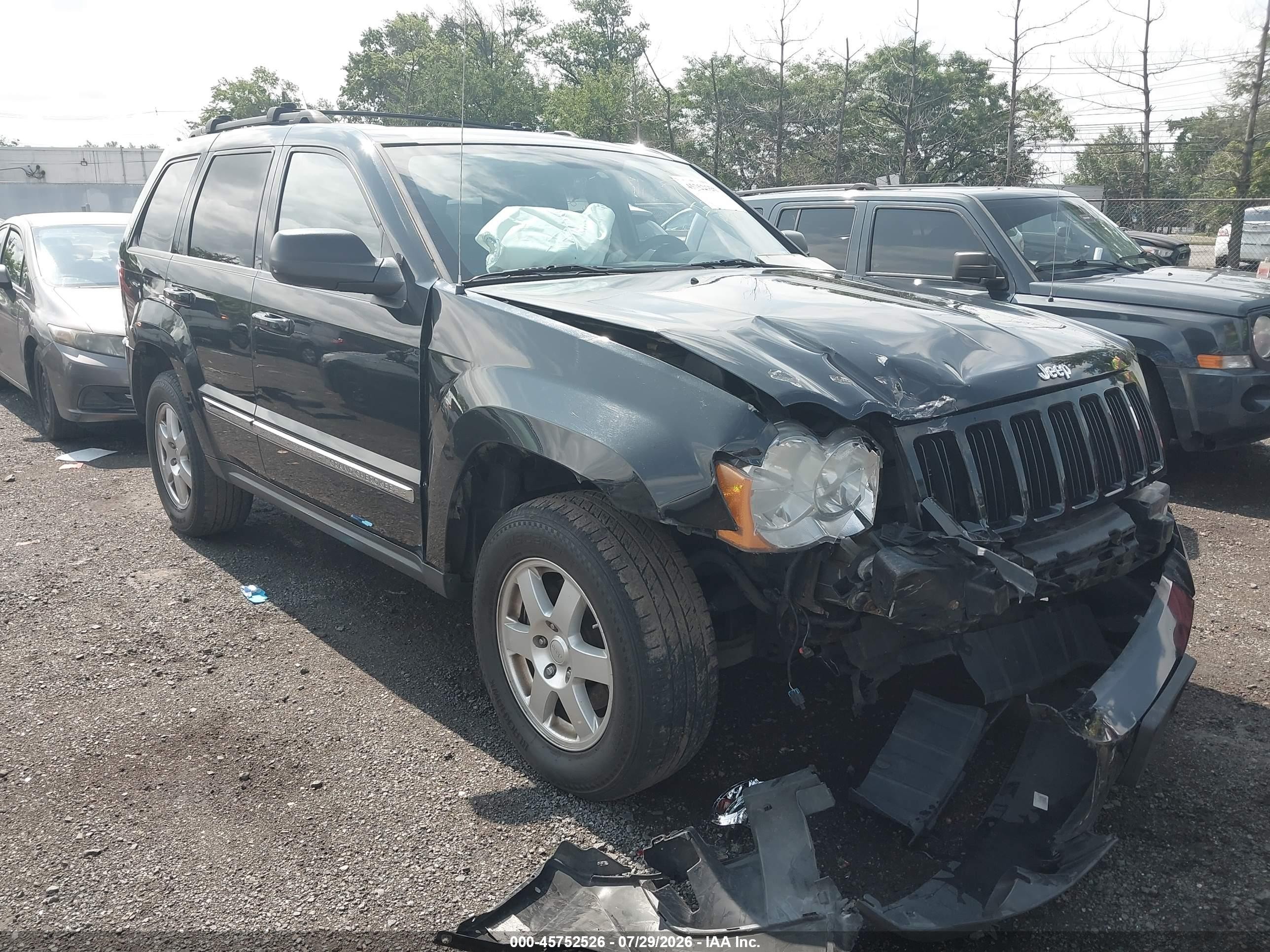2010 Jeep Grand Cherokee Laredo Черный vin: 1J4PR4GK8AC137801