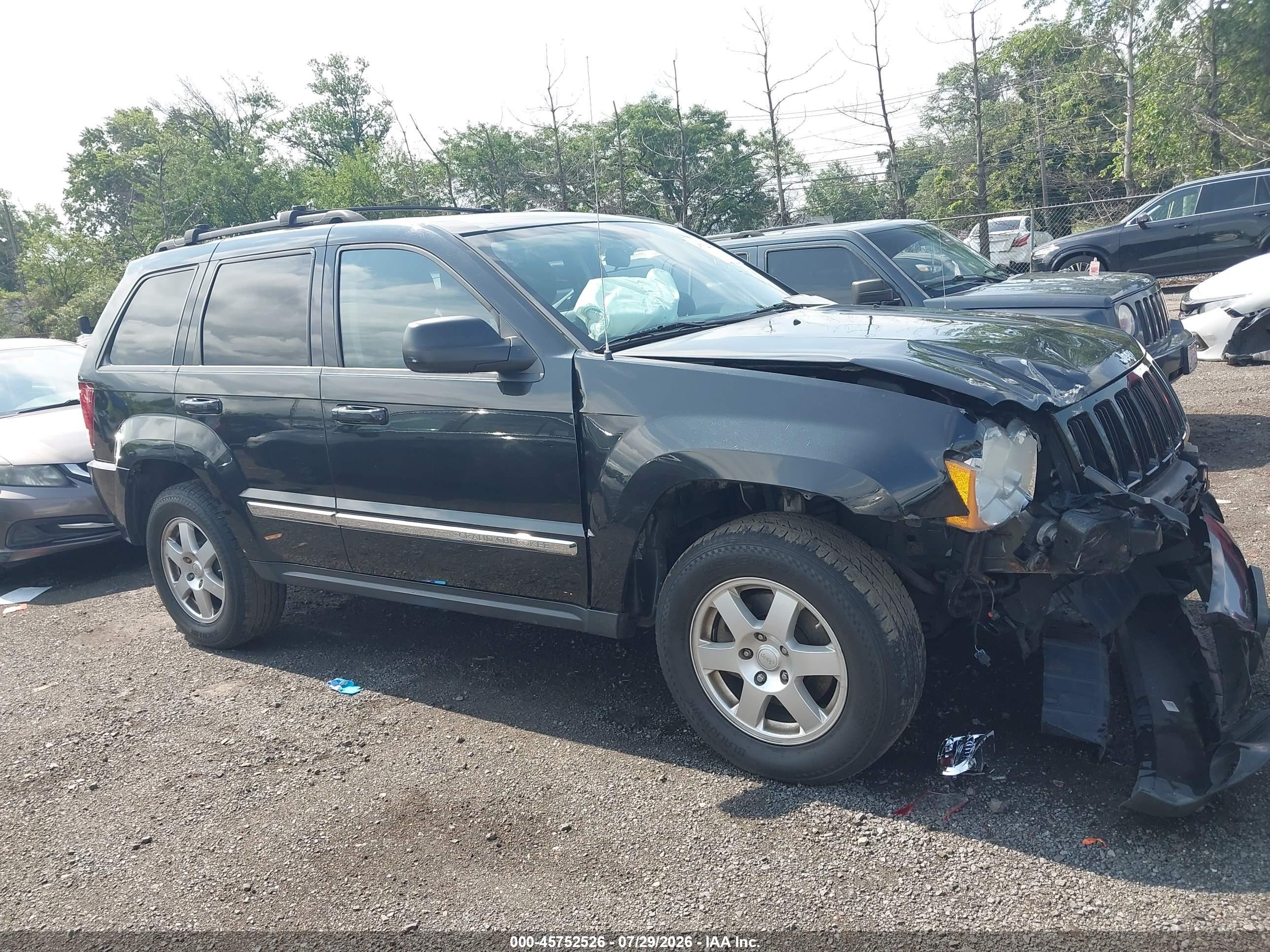 2010 Jeep Grand Cherokee Laredo Черный vin: 1J4PR4GK8AC137801