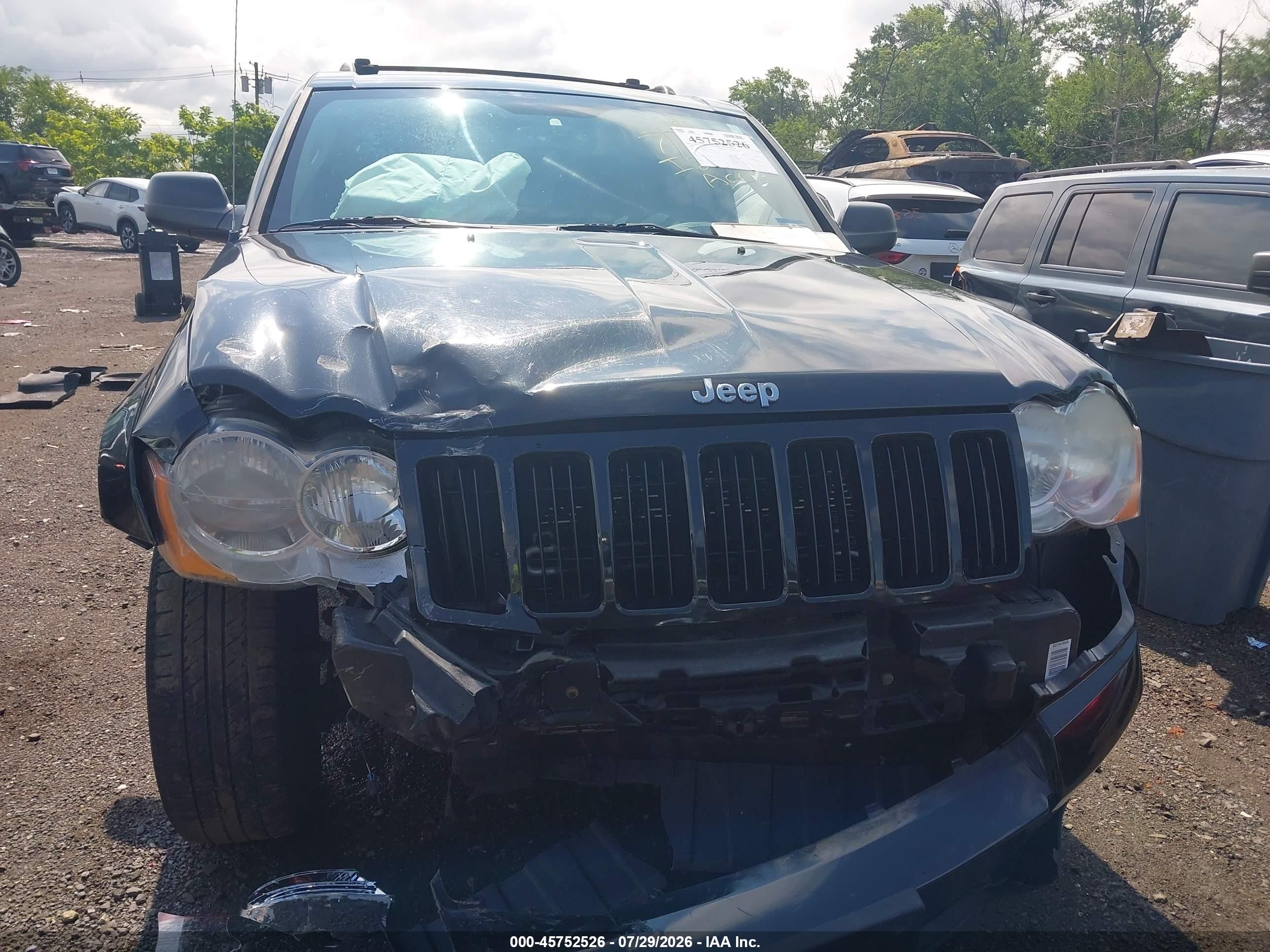 2010 Jeep Grand Cherokee Laredo Черный vin: 1J4PR4GK8AC137801