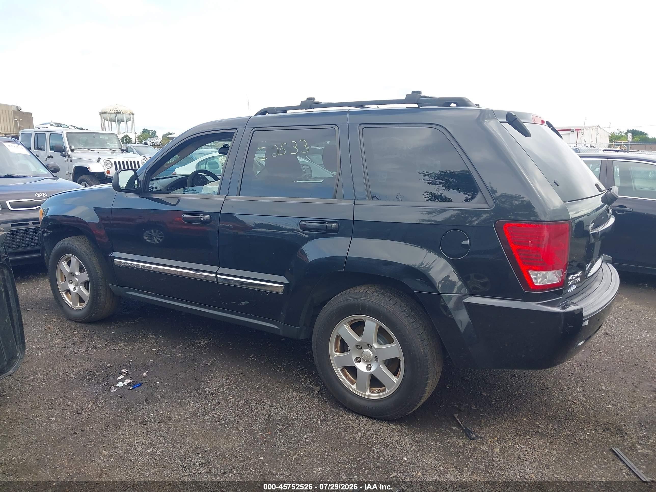 2010 Jeep Grand Cherokee Laredo Черный vin: 1J4PR4GK8AC137801