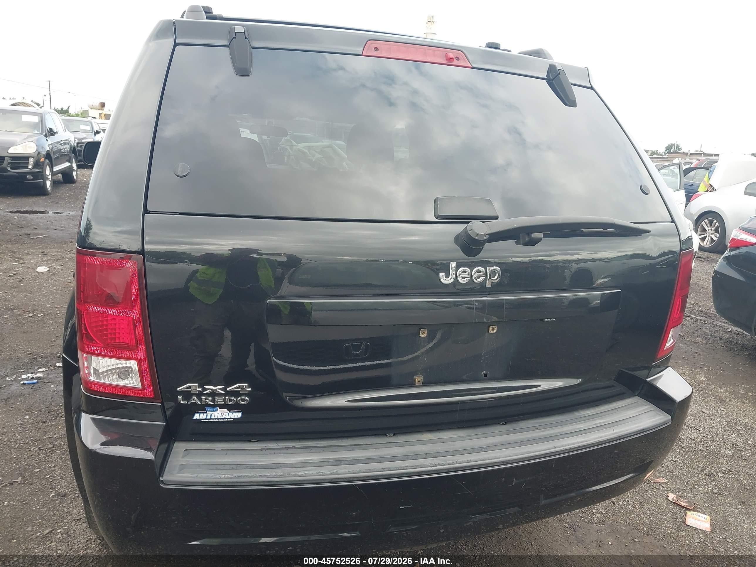2010 Jeep Grand Cherokee Laredo Черный vin: 1J4PR4GK8AC137801