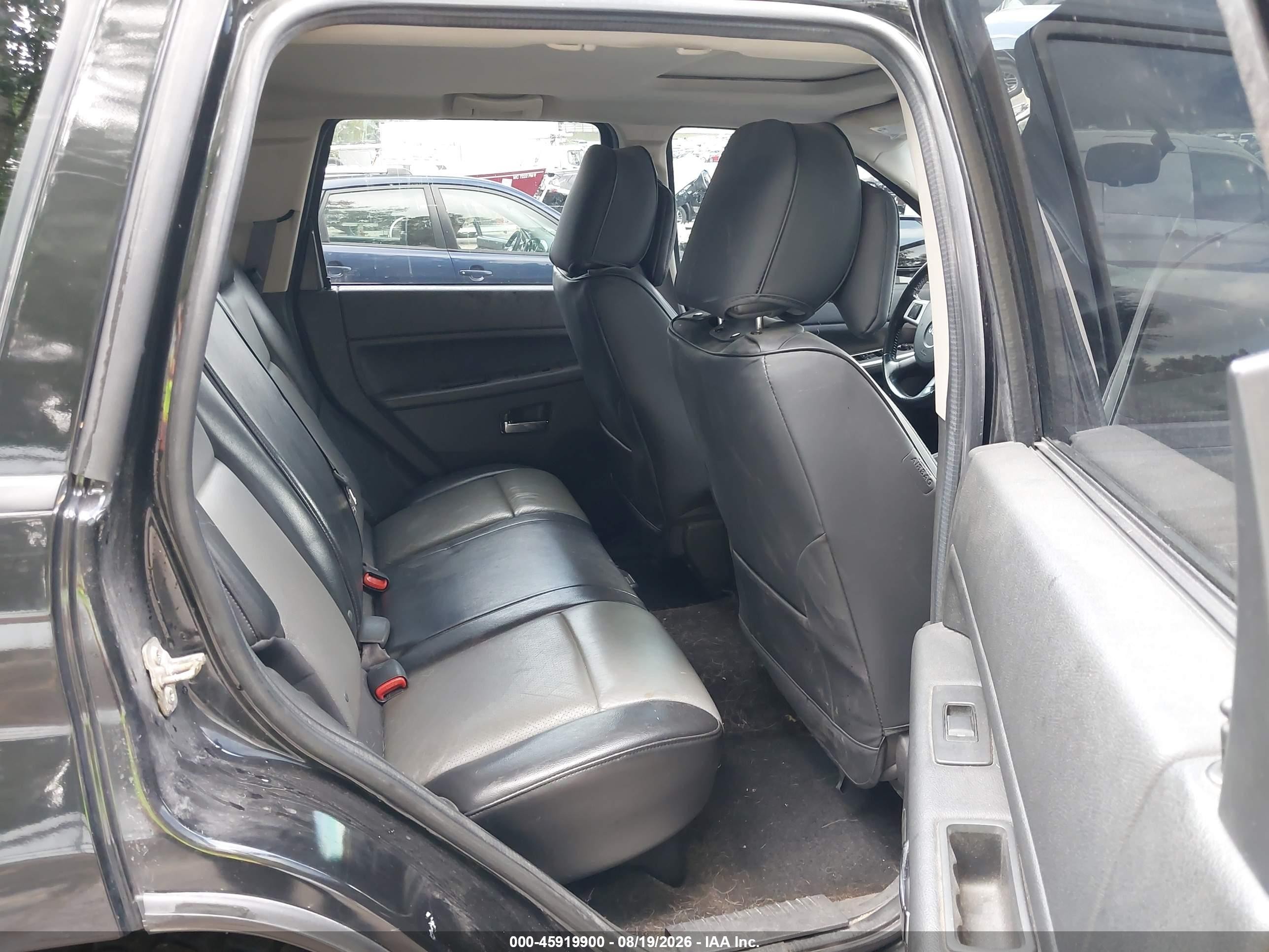 2010 Jeep Grand Cherokee Laredo Черный vin: 1J4PR4GK9AC115953