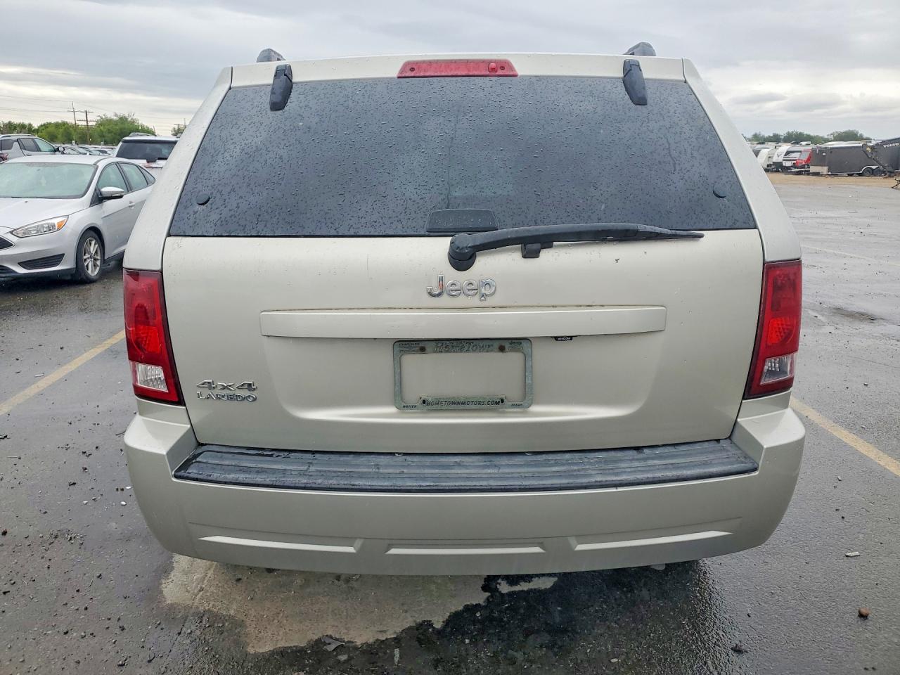 2010 Jeep Grand Cherokee Laredo Желто-коричневый vin: 1J4PR4GKXAC130753