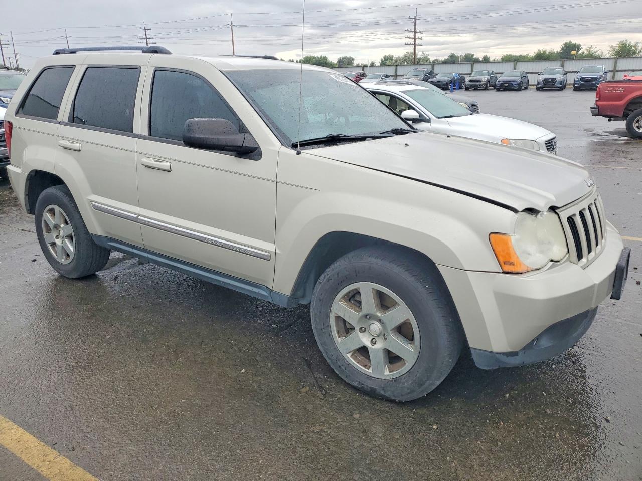 2010 Jeep Grand Cherokee Laredo Желто-коричневый vin: 1J4PR4GKXAC130753