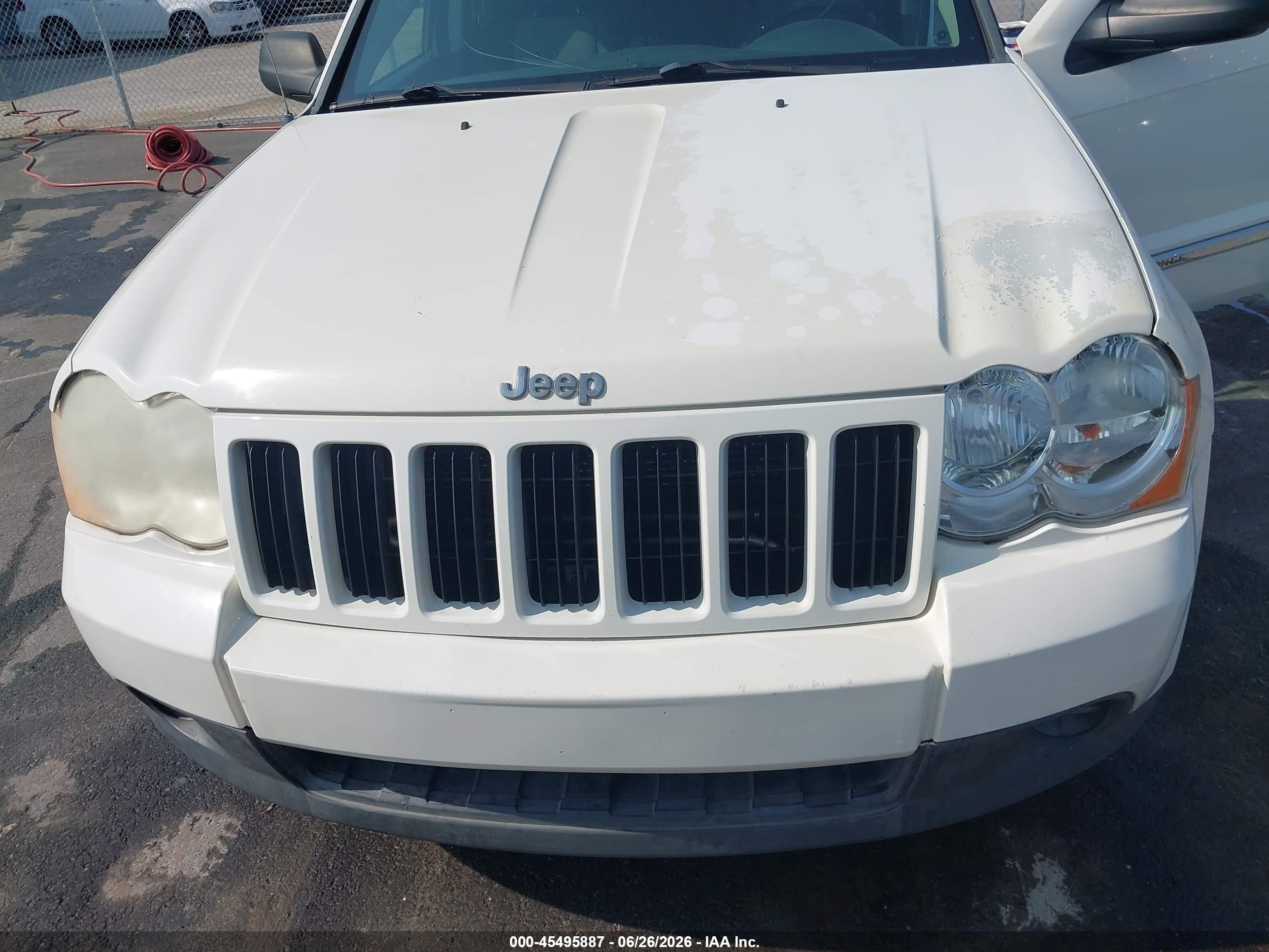 2010 Jeep Grand Cherokee Laredo Белый vin: 1J4PS4GK1AC156422