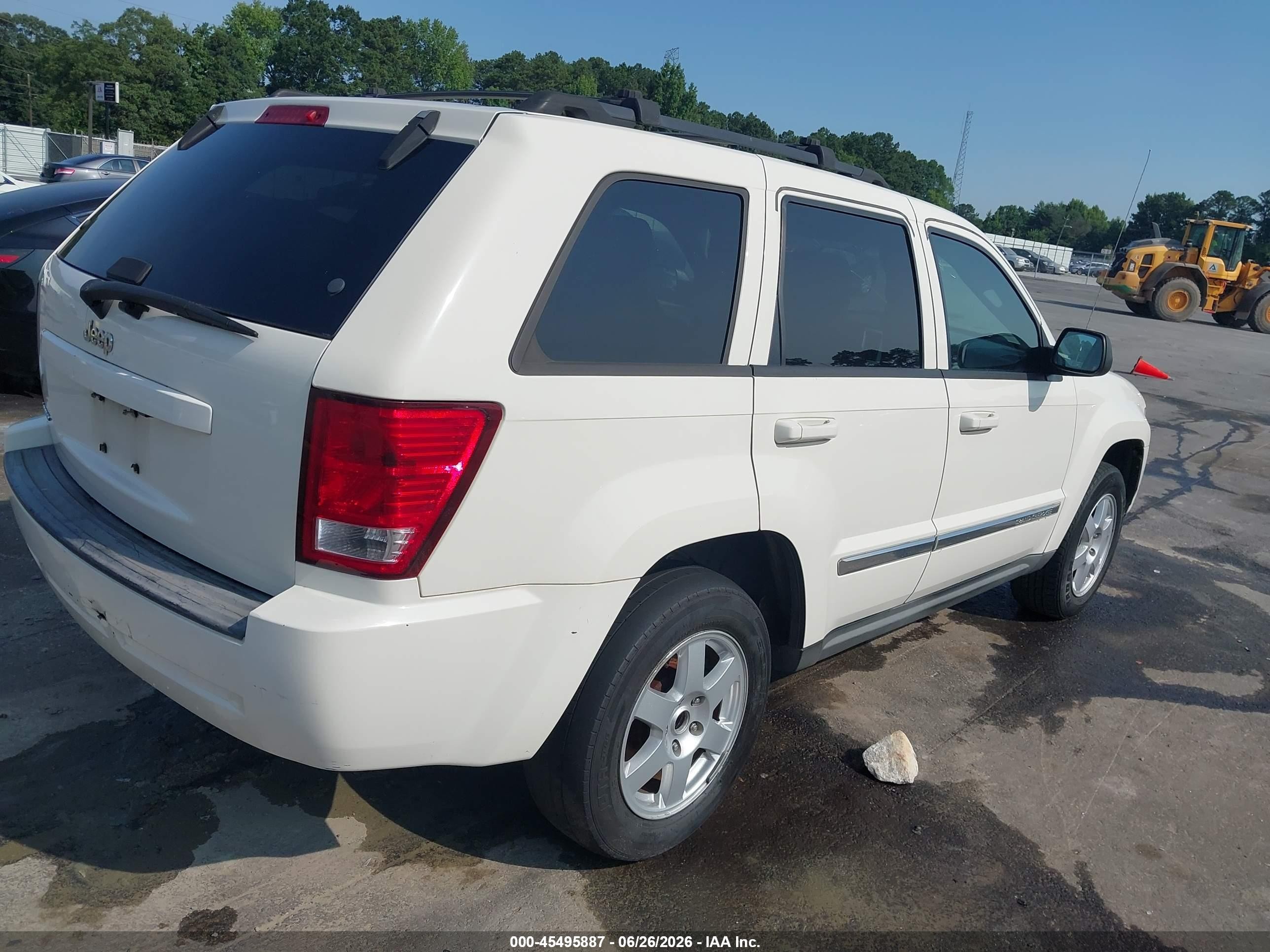 2010 Jeep Grand Cherokee Laredo Белый vin: 1J4PS4GK1AC156422