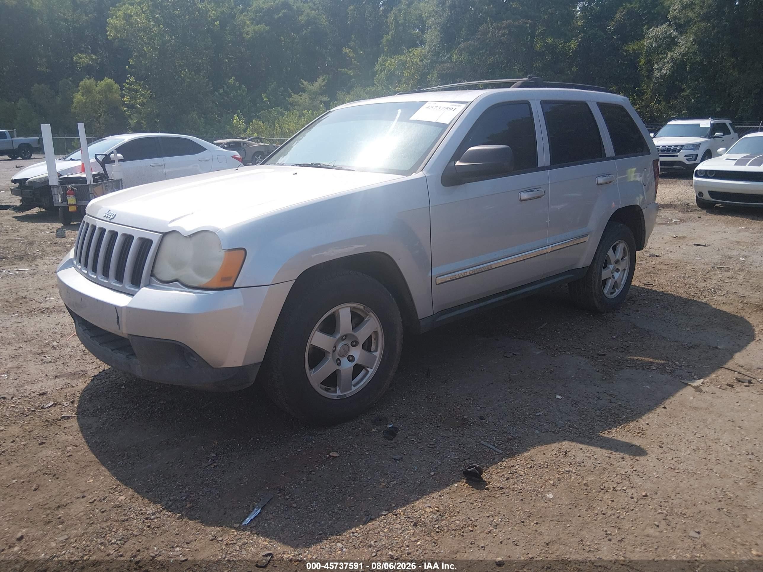 2010 Jeep Grand Cherokee Laredo Серебряный vin: 1J4PS4GK7AC156537