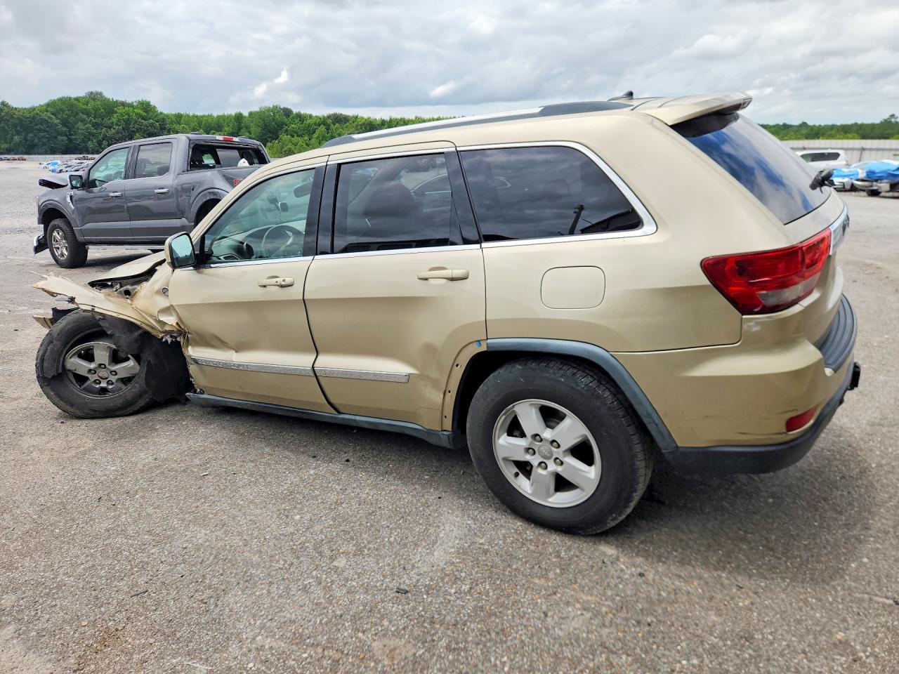 2011 Jeep Grnd Cheroke Gold vin: 1J4RR4GG2BC643310