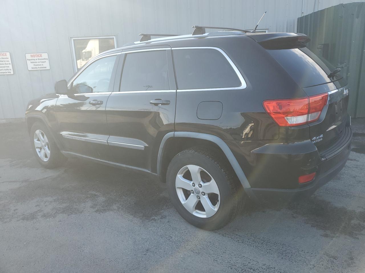 2011 Jeep Grand Cherokee Laredo Charcoal vin: 1J4RR4GG2BC657630 Damage: Rear Bumper/Cover, Scraped, 5 To 6 Inches