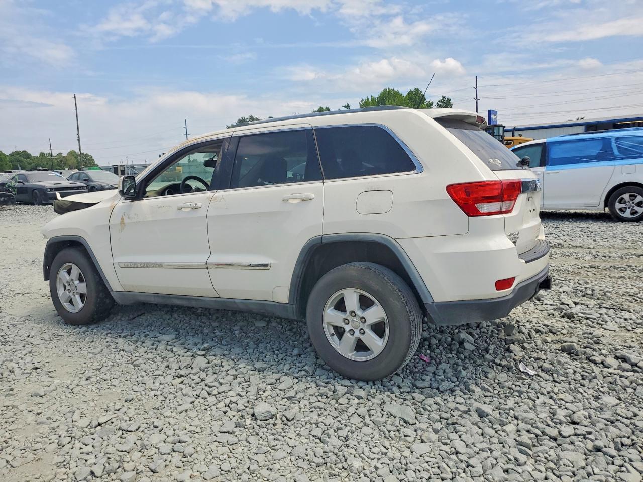 2011 Jeep Grand Cherokee Laredo Белый vin: 1J4RR4GG4BC519653
