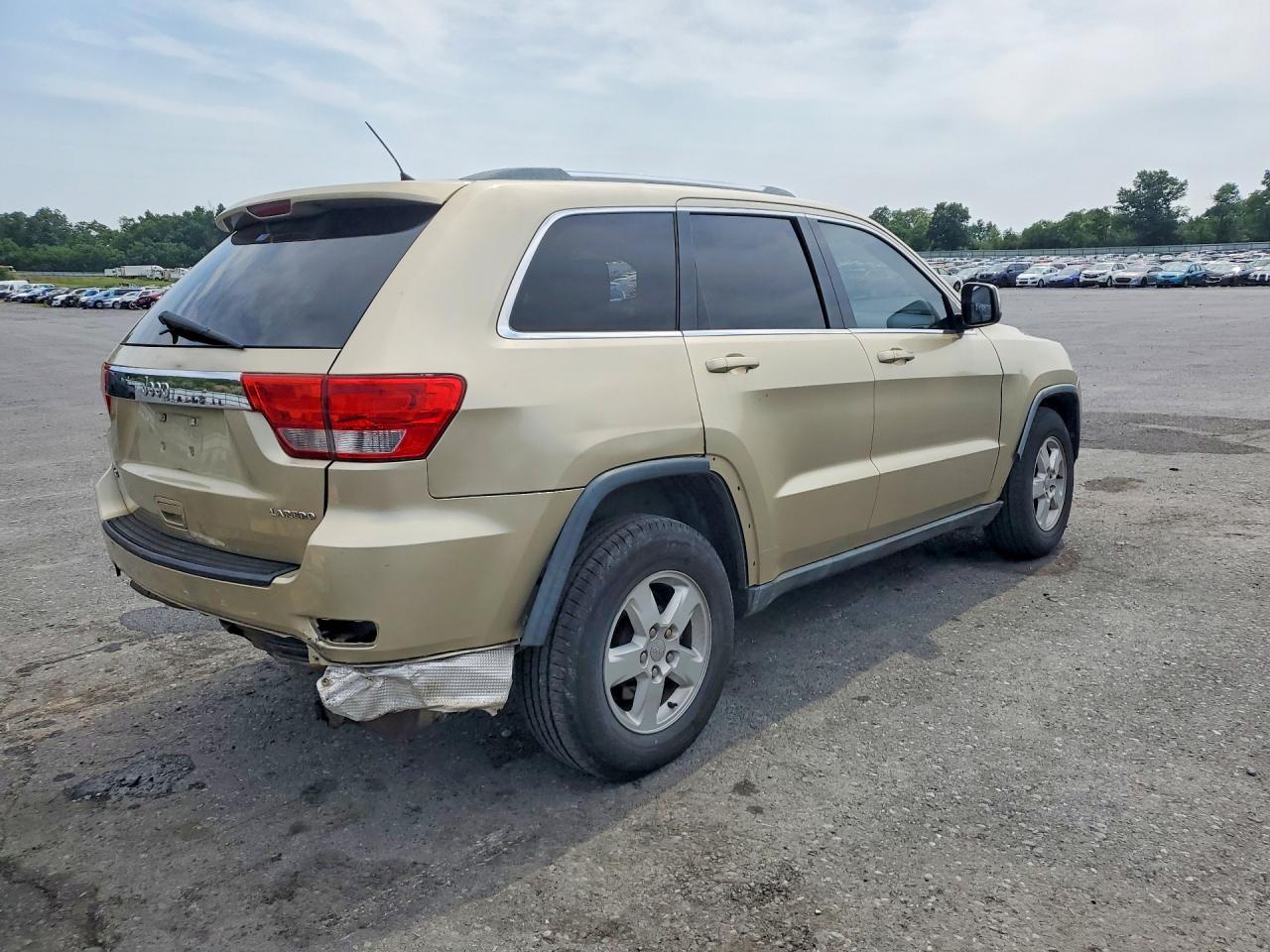 2011 Jeep Grand Cherokee Sport Gold vin: 1J4RR4GG6BC567056